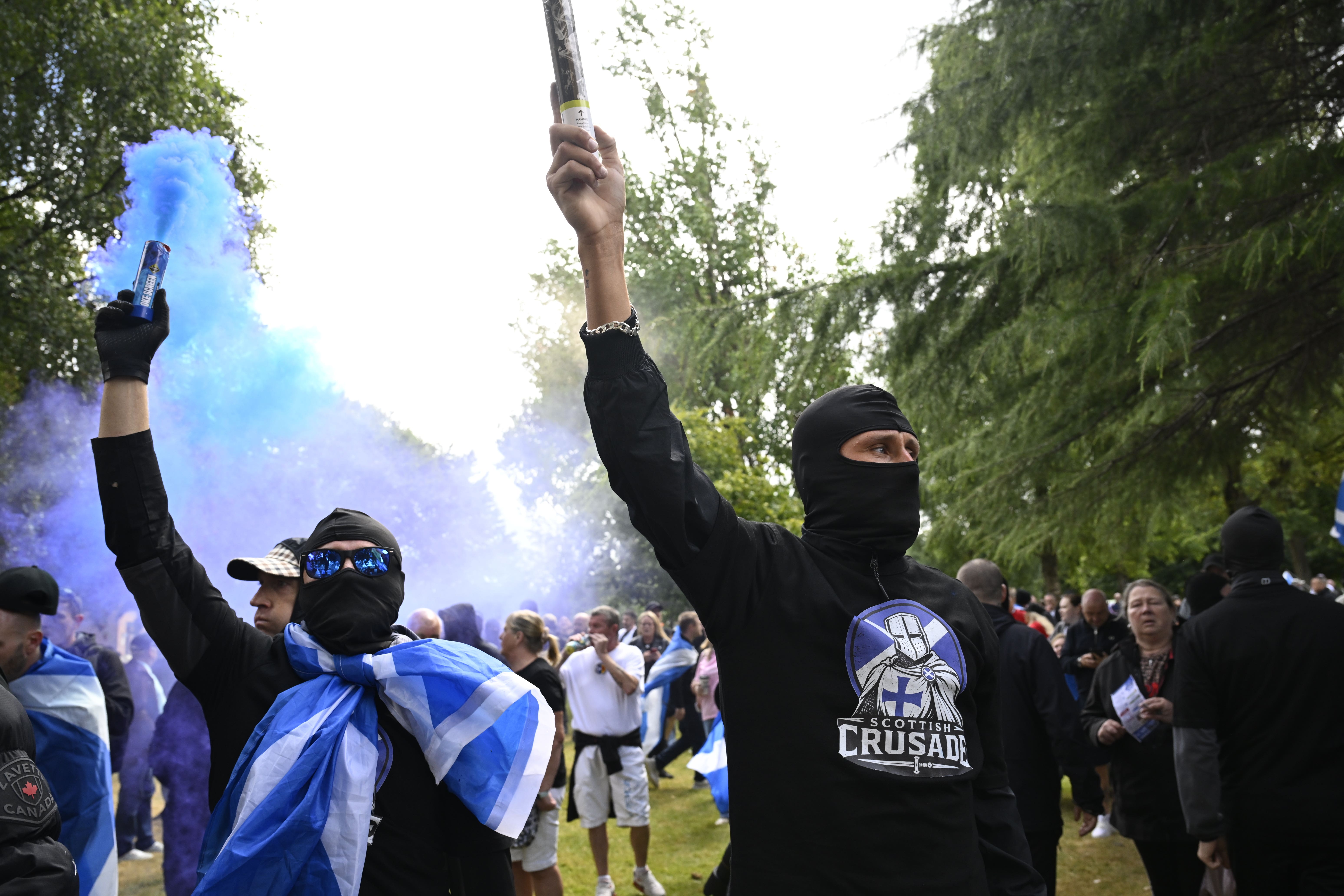 Demonstrators during an anti-immigration protest, organised by Unite the Clans Scotland, at Glasgow Green (PA Wire)