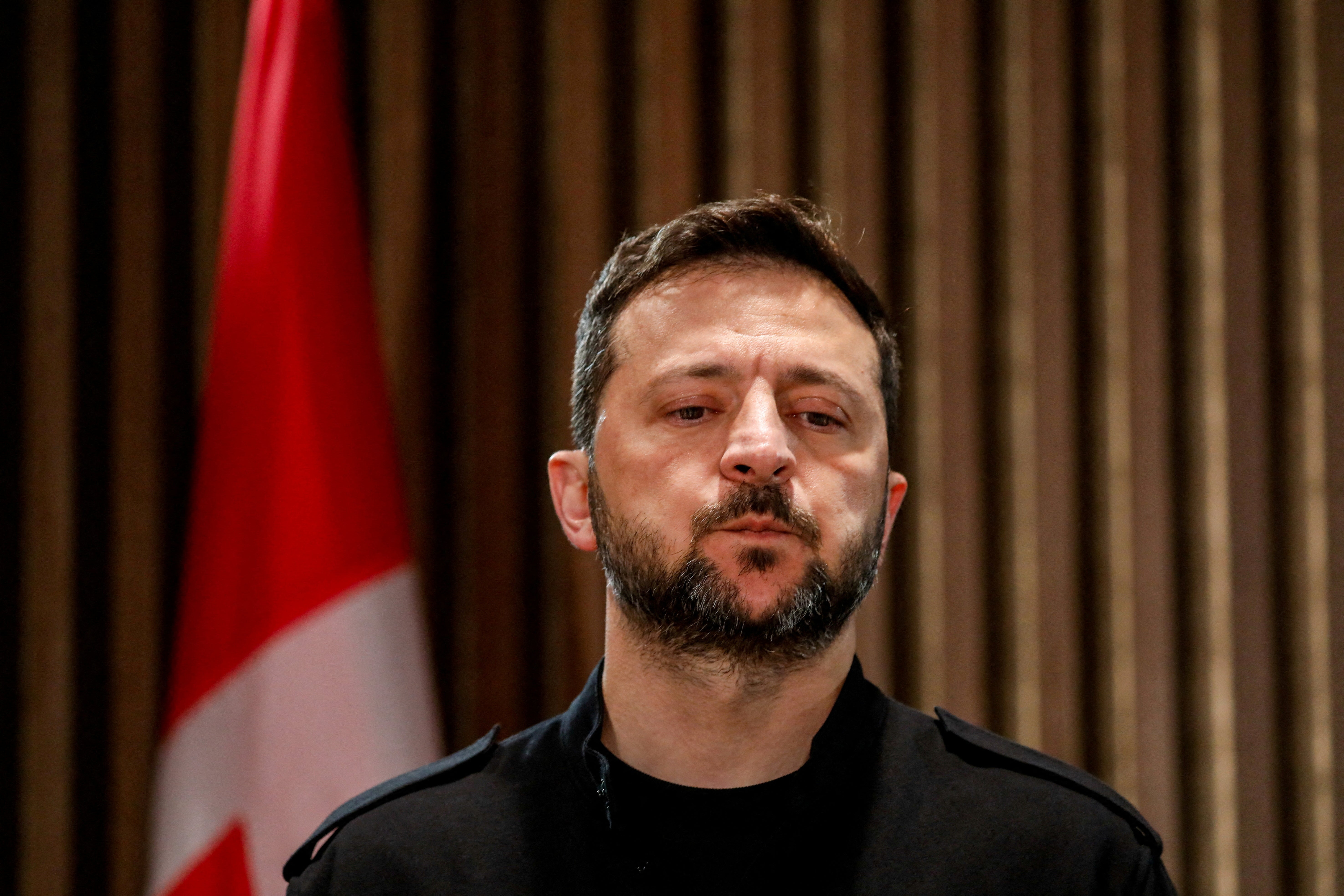 Ukrainian President Volodymyr Zelenskiy looks on during the G7 Leaders' Summit in Kananaskis, in Alberta, Canada, 17 June 2025 (Reuters)