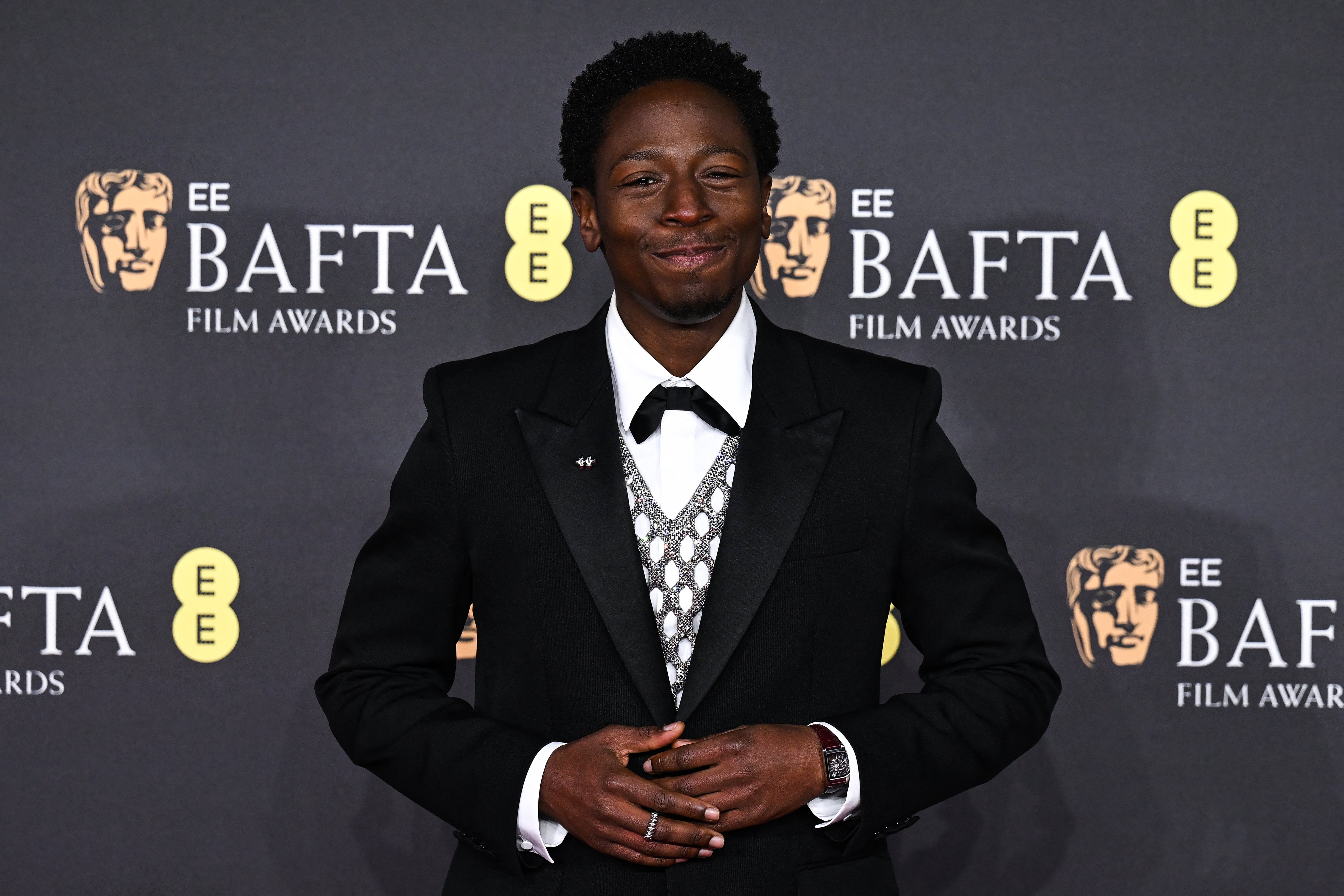 British actor David Jonsson poses on the red carpet upon arrival at the BAFTA British Academy Film Awards at the Royal Festival Hall, Southbank Centre, in London, on February 16, 2025