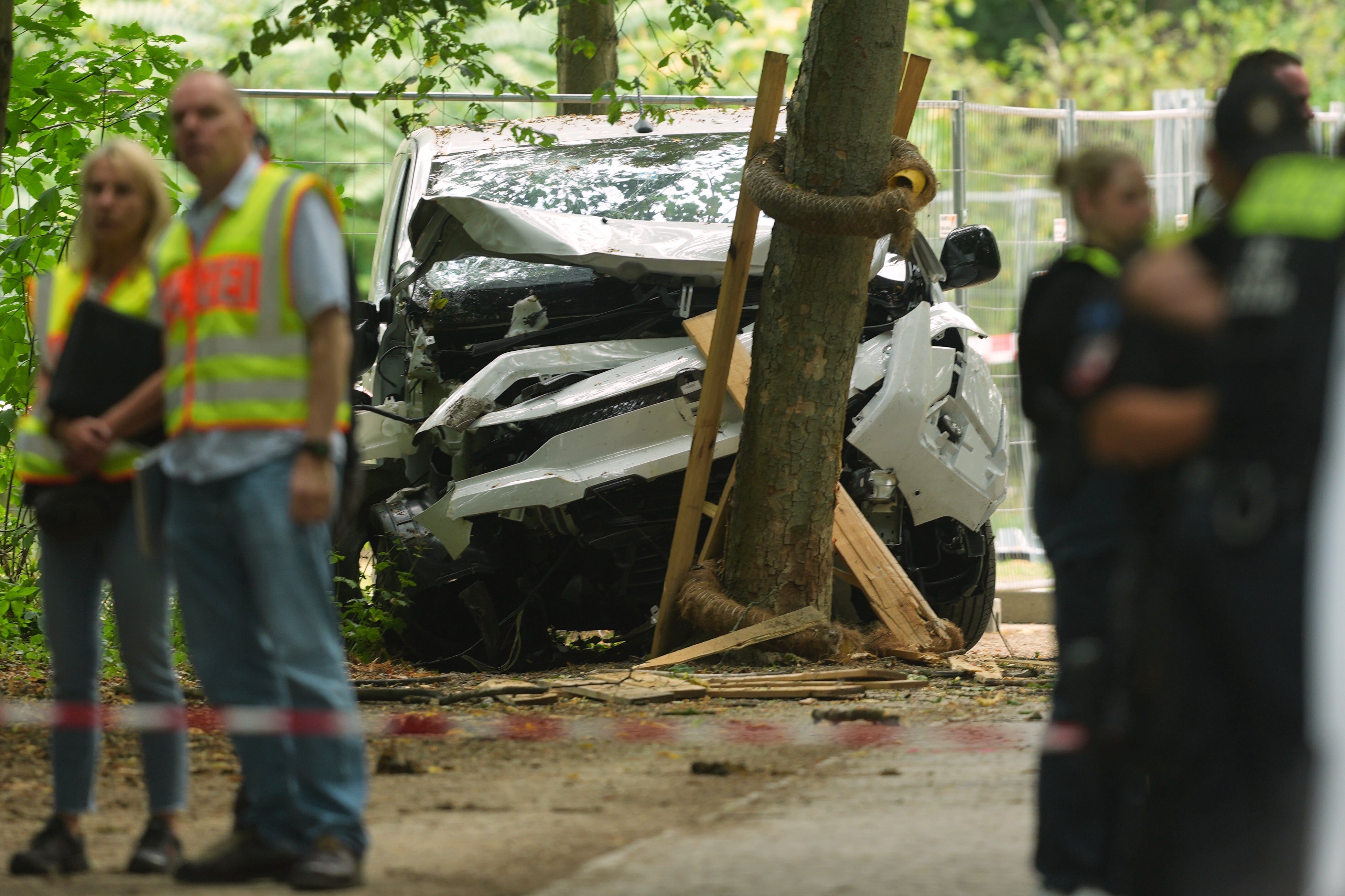 A wrecked vehicle at the scene of the attack (AP)