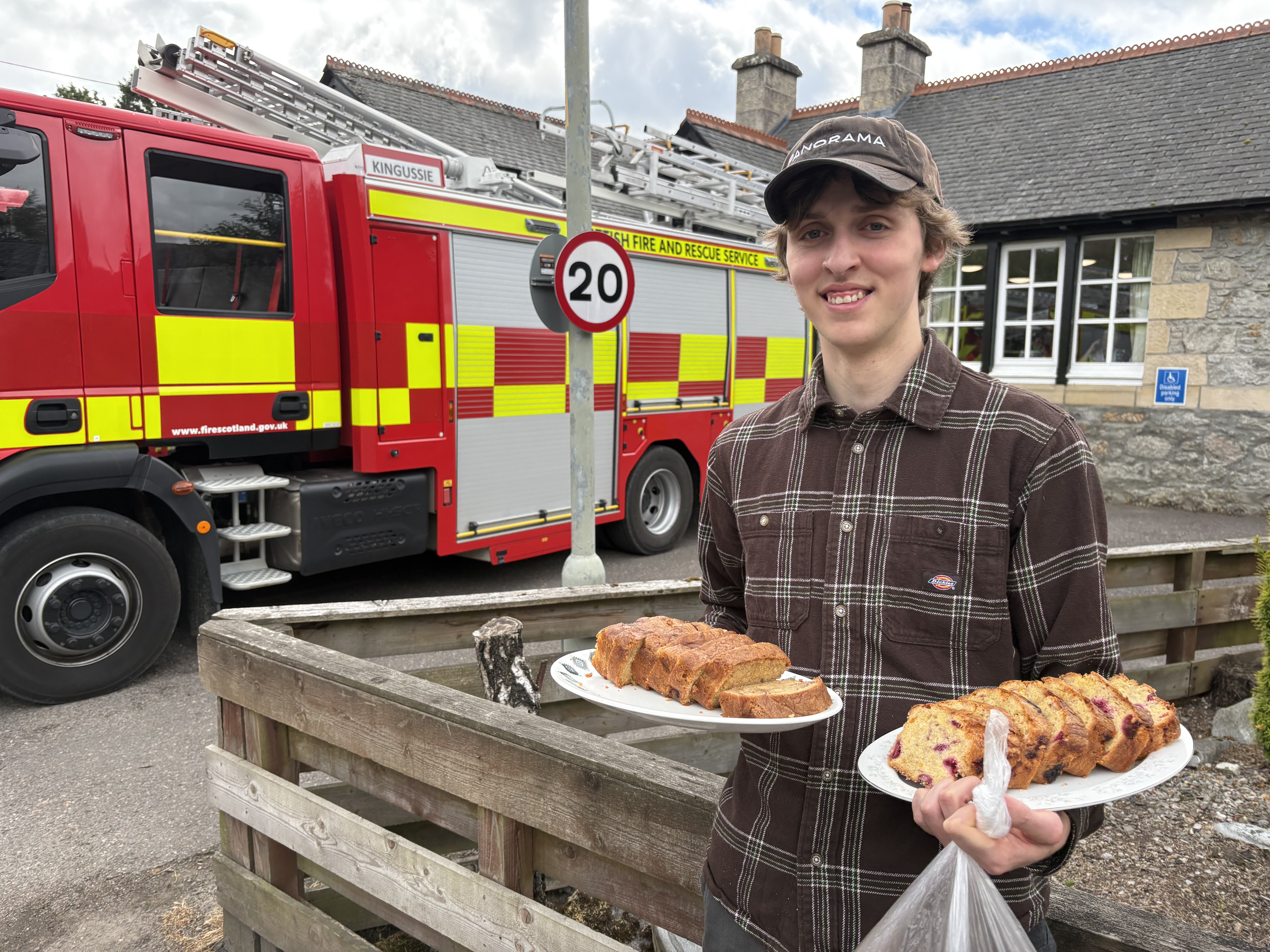 Tom Lake, 21, takes food to firefighters in Nethy Bridge, near to the wildfire in the Cairngorms (Neil Pooran/PA) (PA Wire)
