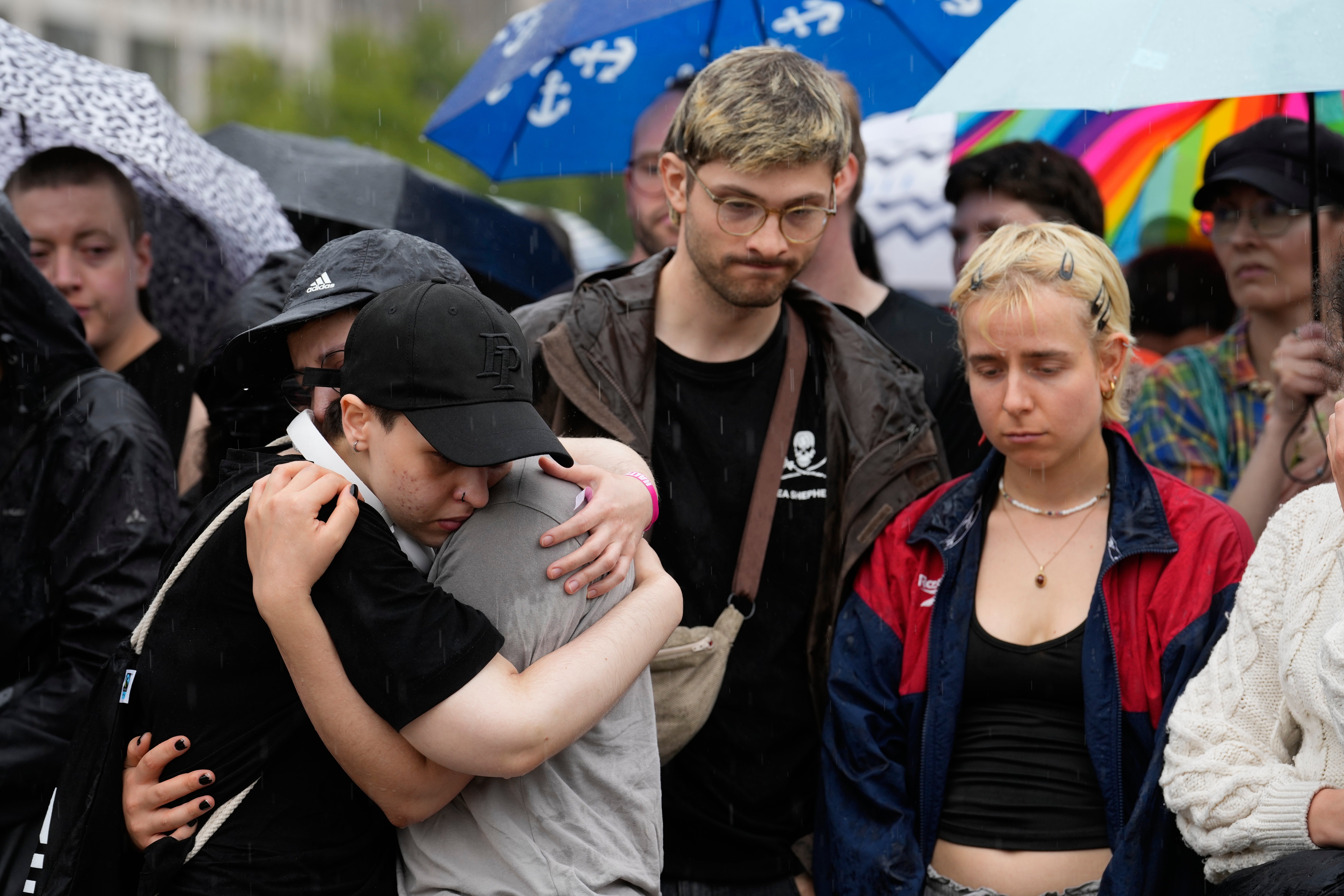 People gather outside the Brandenburg gate (AP)