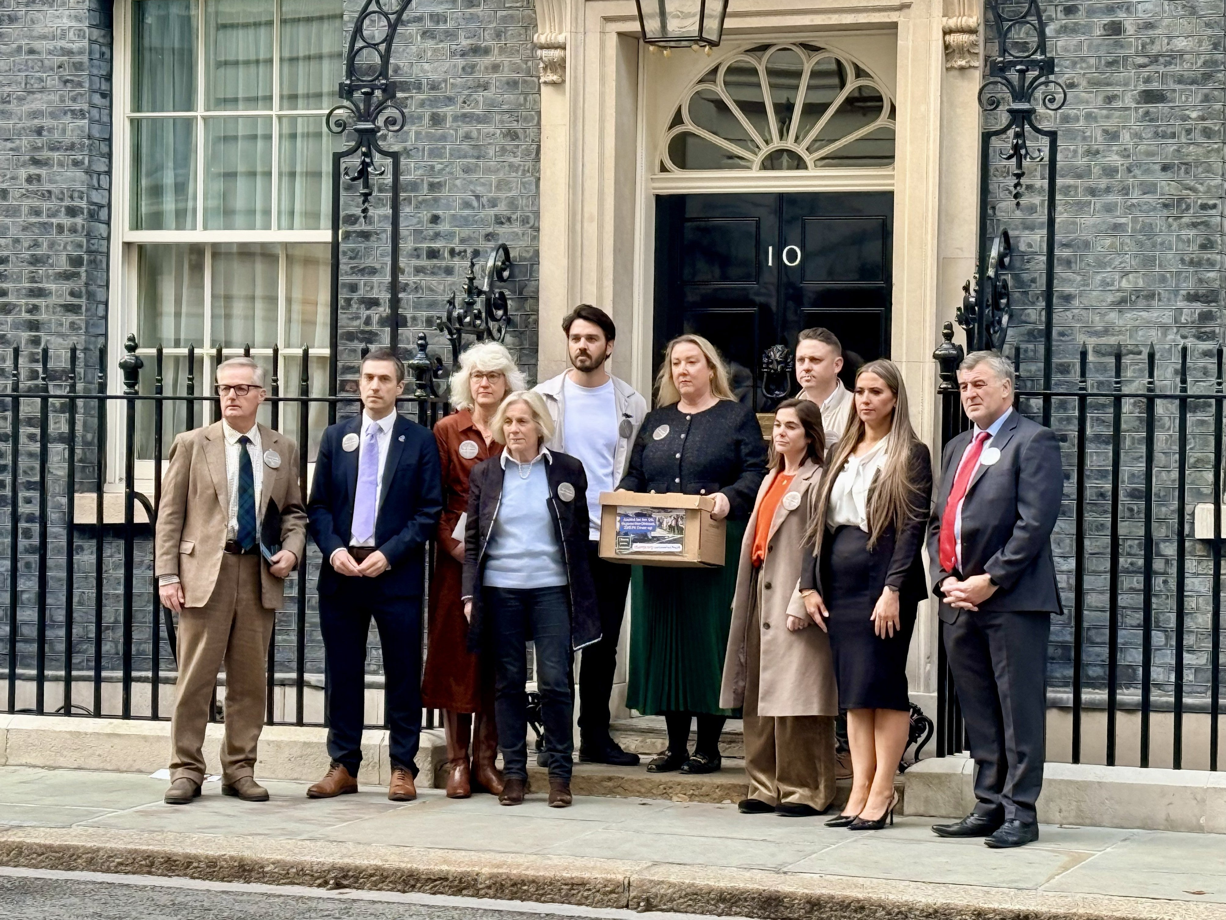 Some of the family members of the victims of the 1994 RAF Chinook helicopter disaster outside No 10 Downing Street