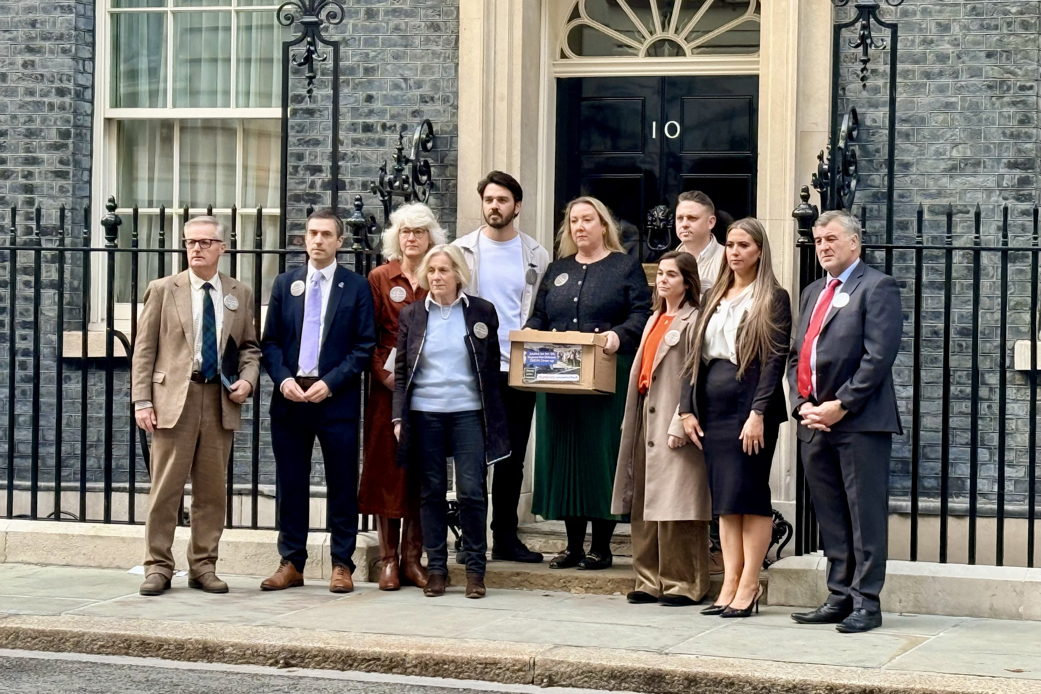 Some of the family members of the victims of the 1994 RAF Chinook helicopter disaster outside No 10 Downing Street (PA)