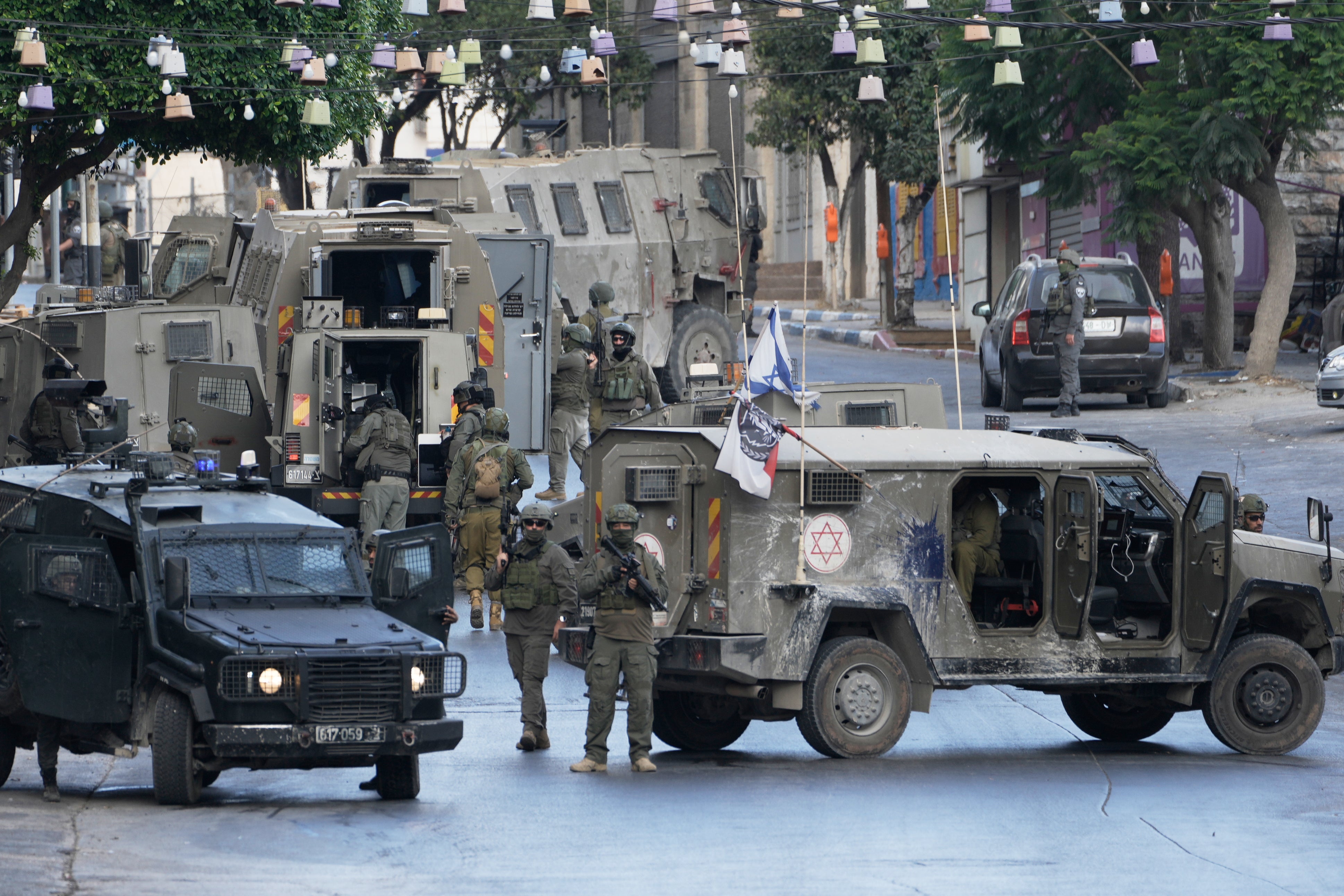 Israeli soldiers operate in the West Bank Palestinians city of Nablus, Sunday, July 26, 2026. (AP Photo/Majdi Mohammad)