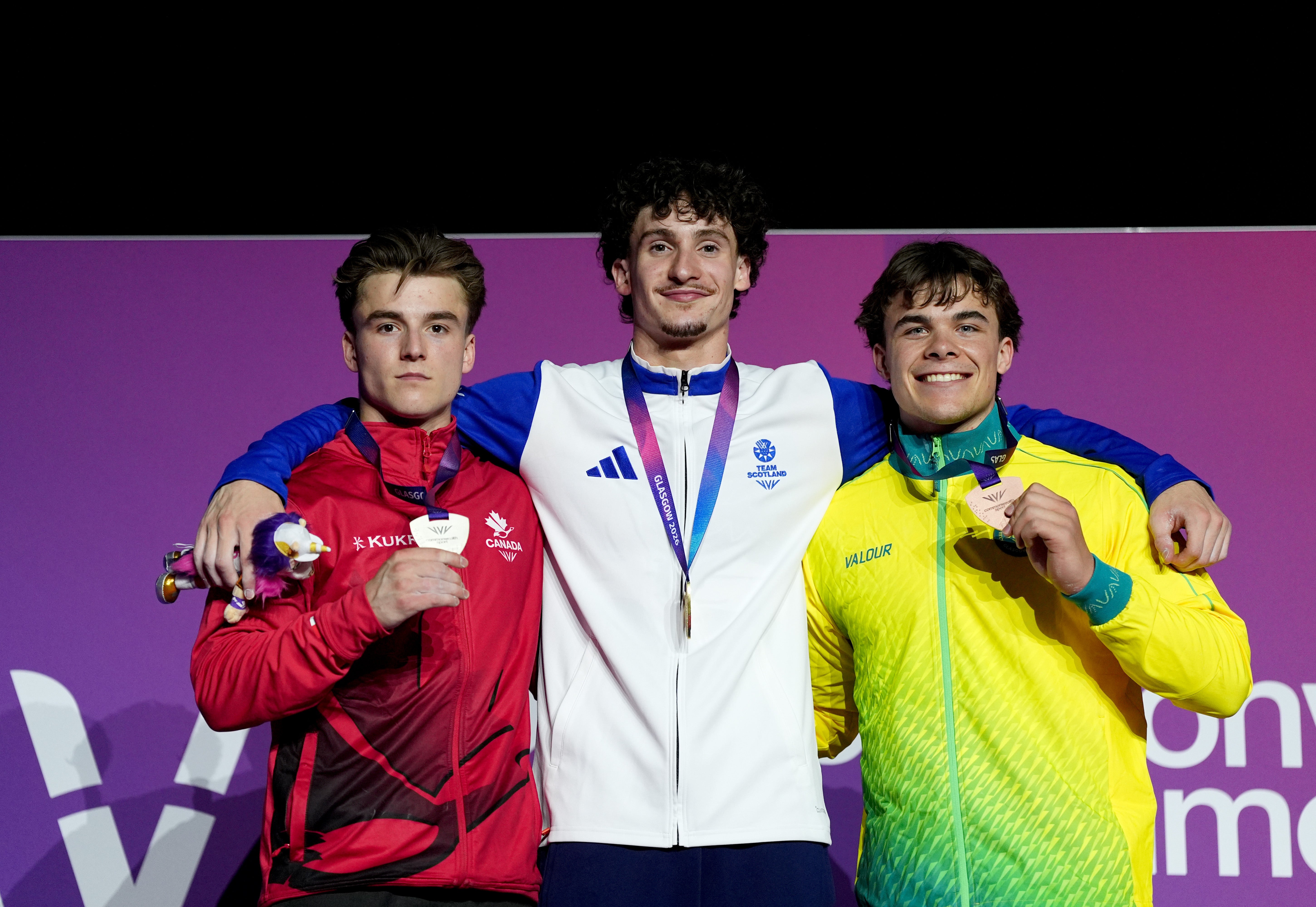 The all-around medallists celebrate on the podium
