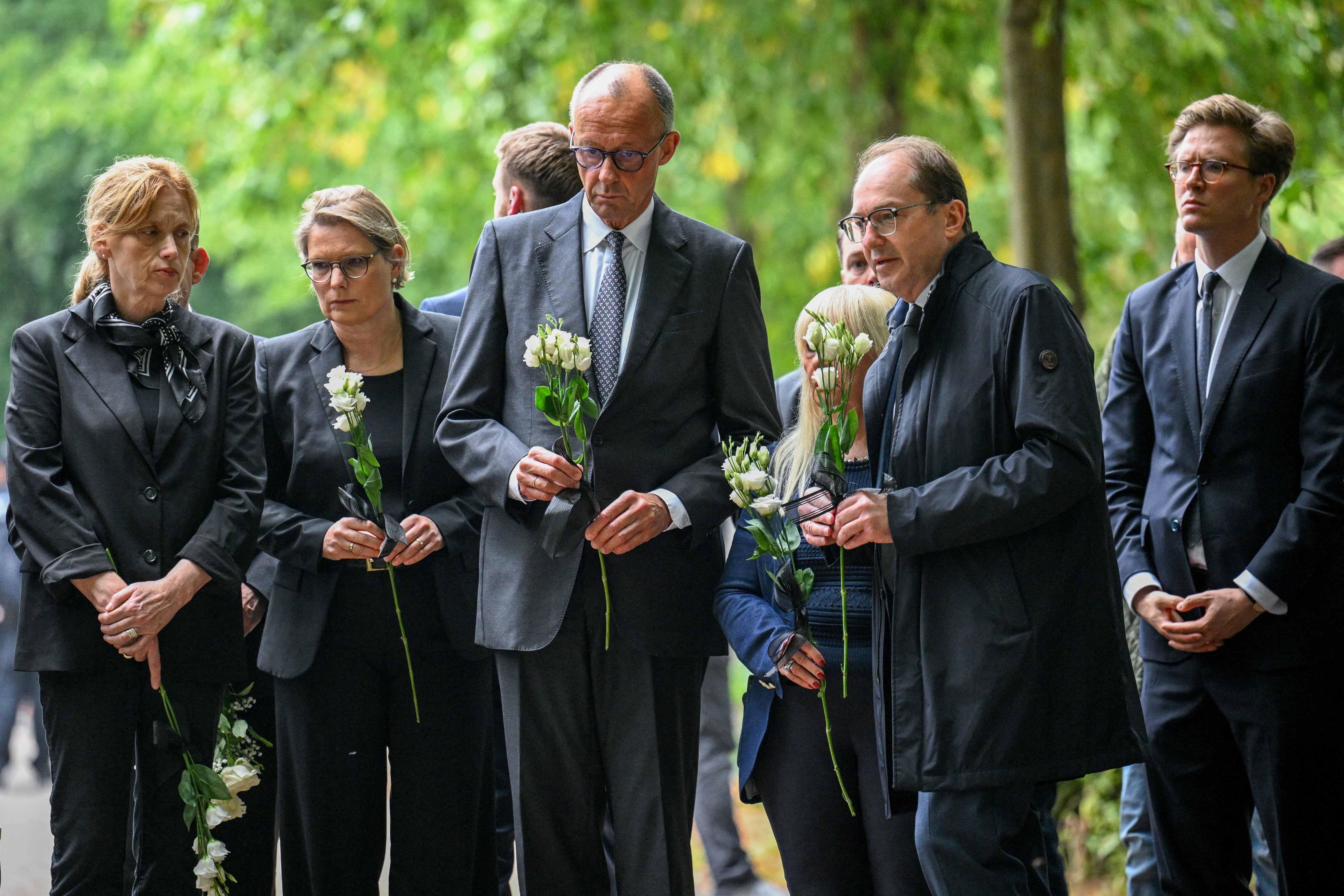 German chancellor Friedrich Merz and interior minister Alexander Dobrindt pay their respects at Tiergarten park