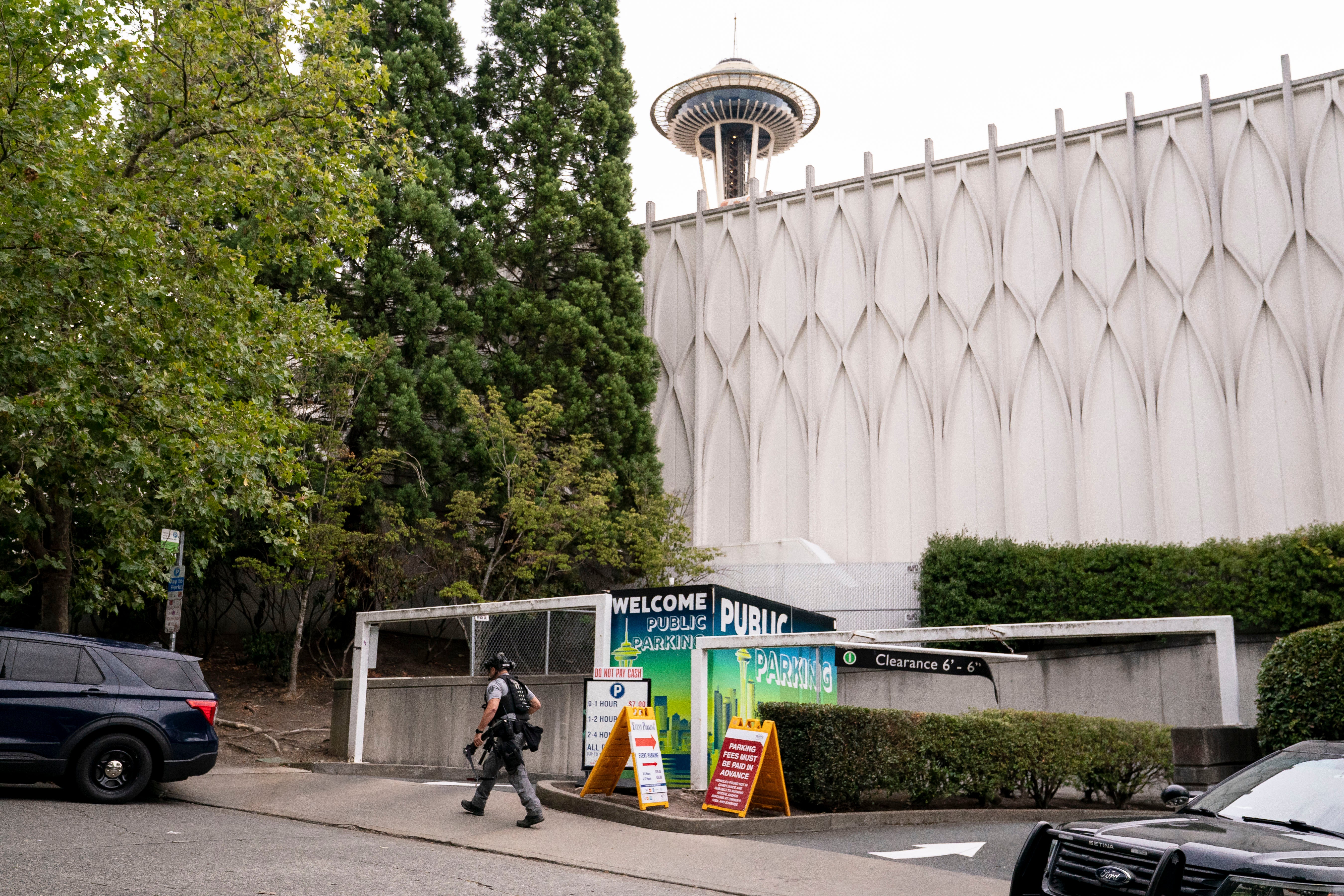A police officer walks on patrol after a mass shooting at the Bite of Seattle food festival on 26 July 2026 in Seattle, Washington