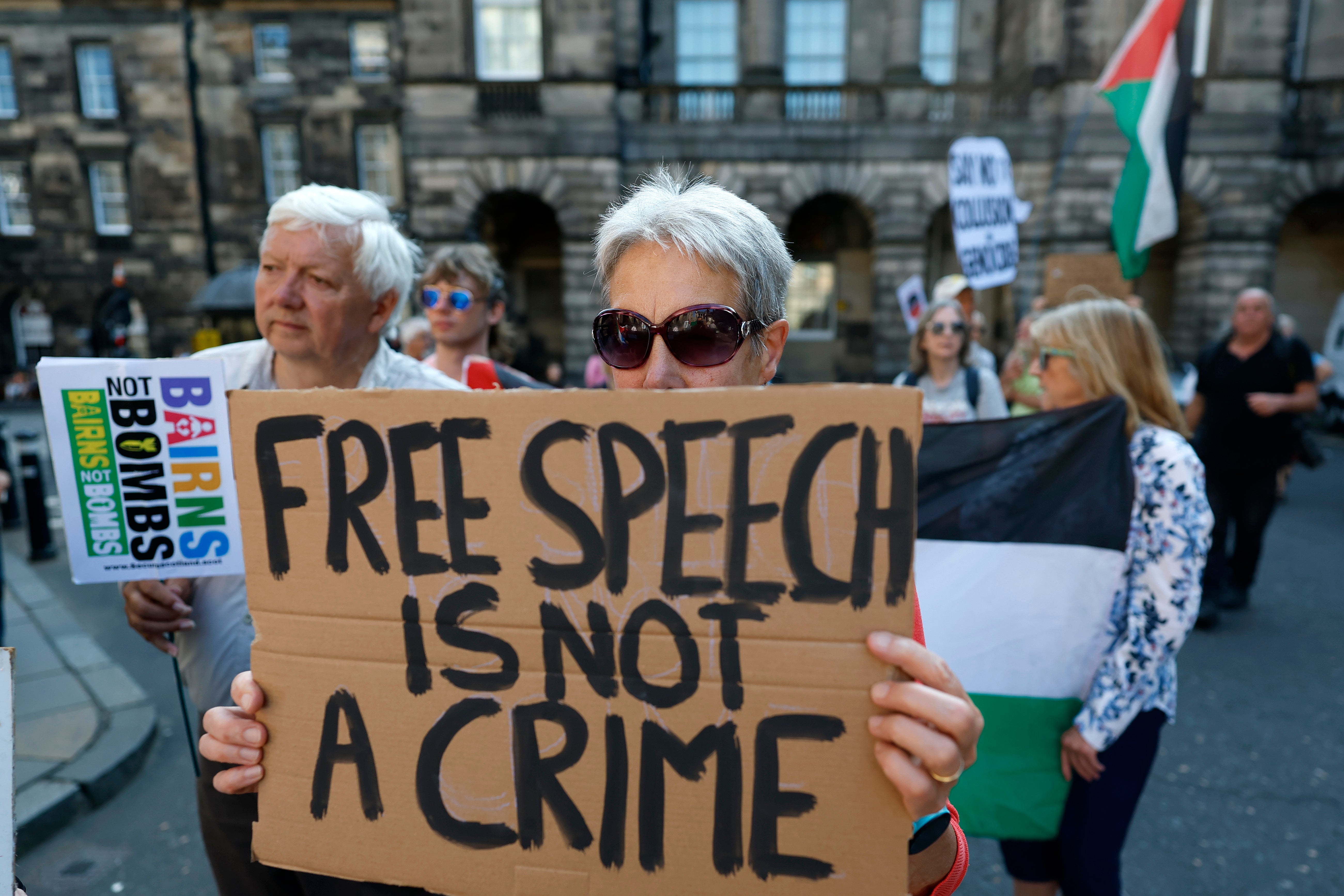 Activists protesting the Palestine Action ban outside court in Edinburgh (Getty)