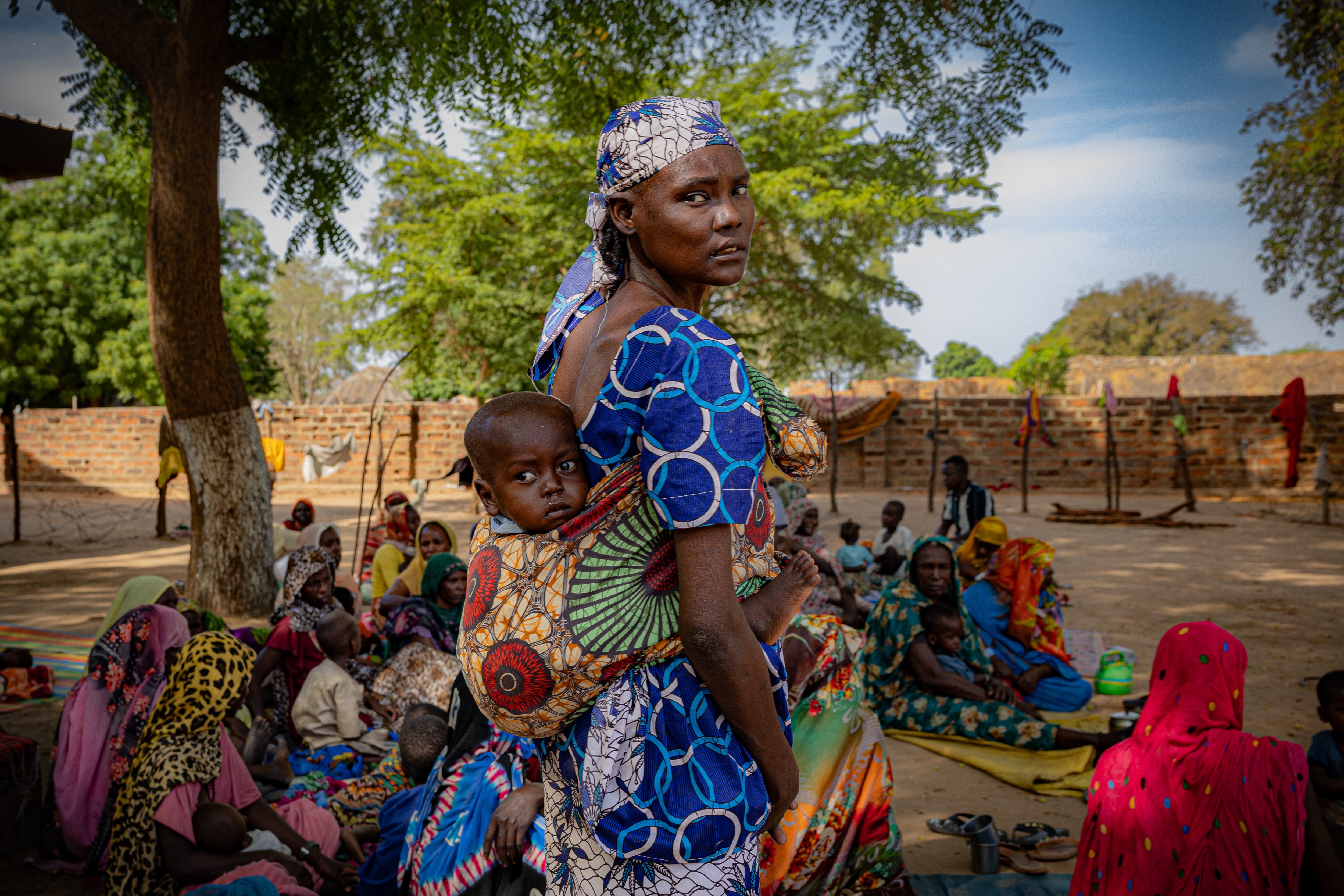 Sudanese refugee mothers camp in the courtyard of Birao's only hospital in the CAR