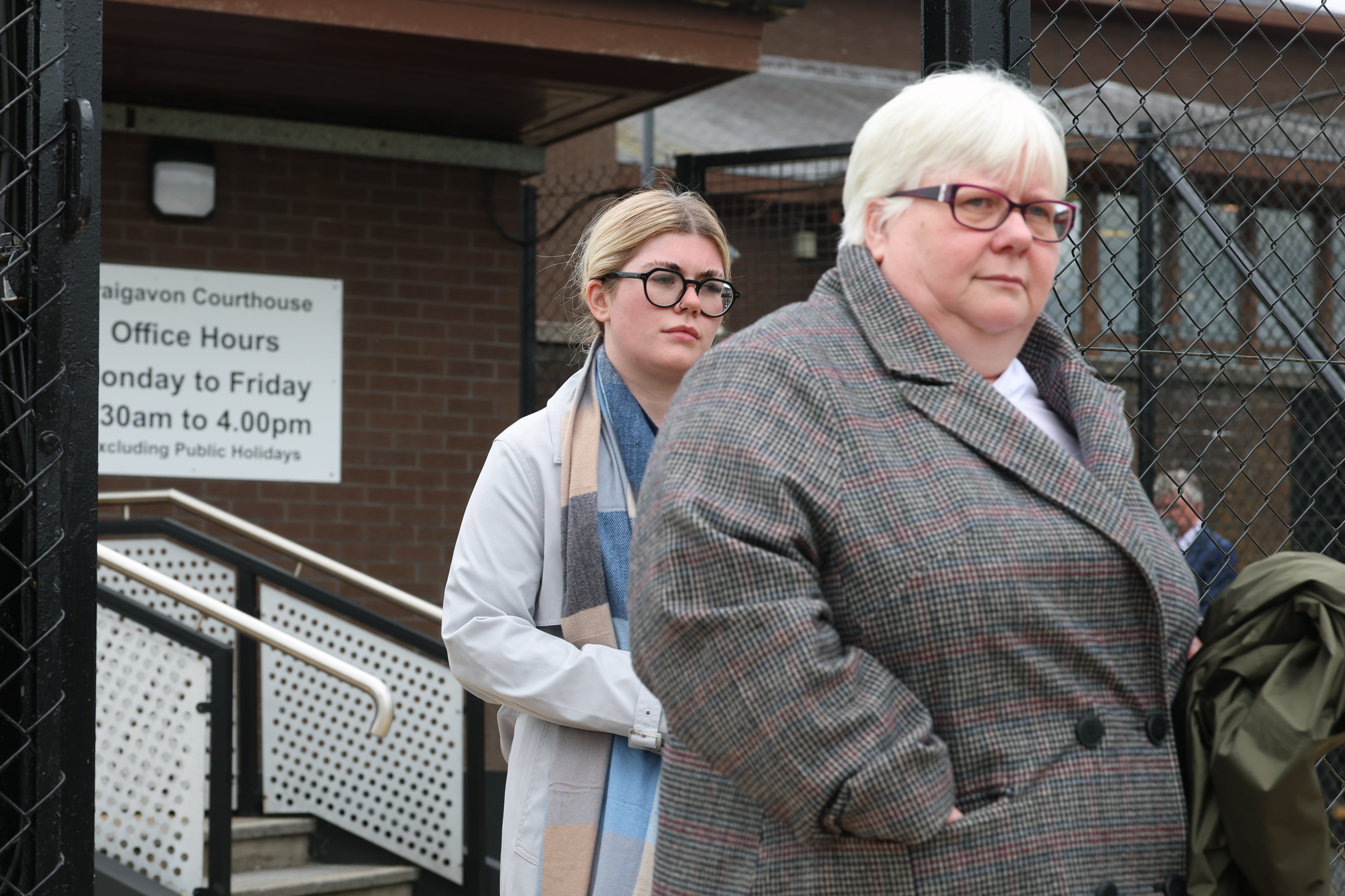 Health Care Assistant Ciara Corvan (left) with her mother leaving Craigavon Crown Court, where she was sentenced to two years probation and 100 hours community service (PA)