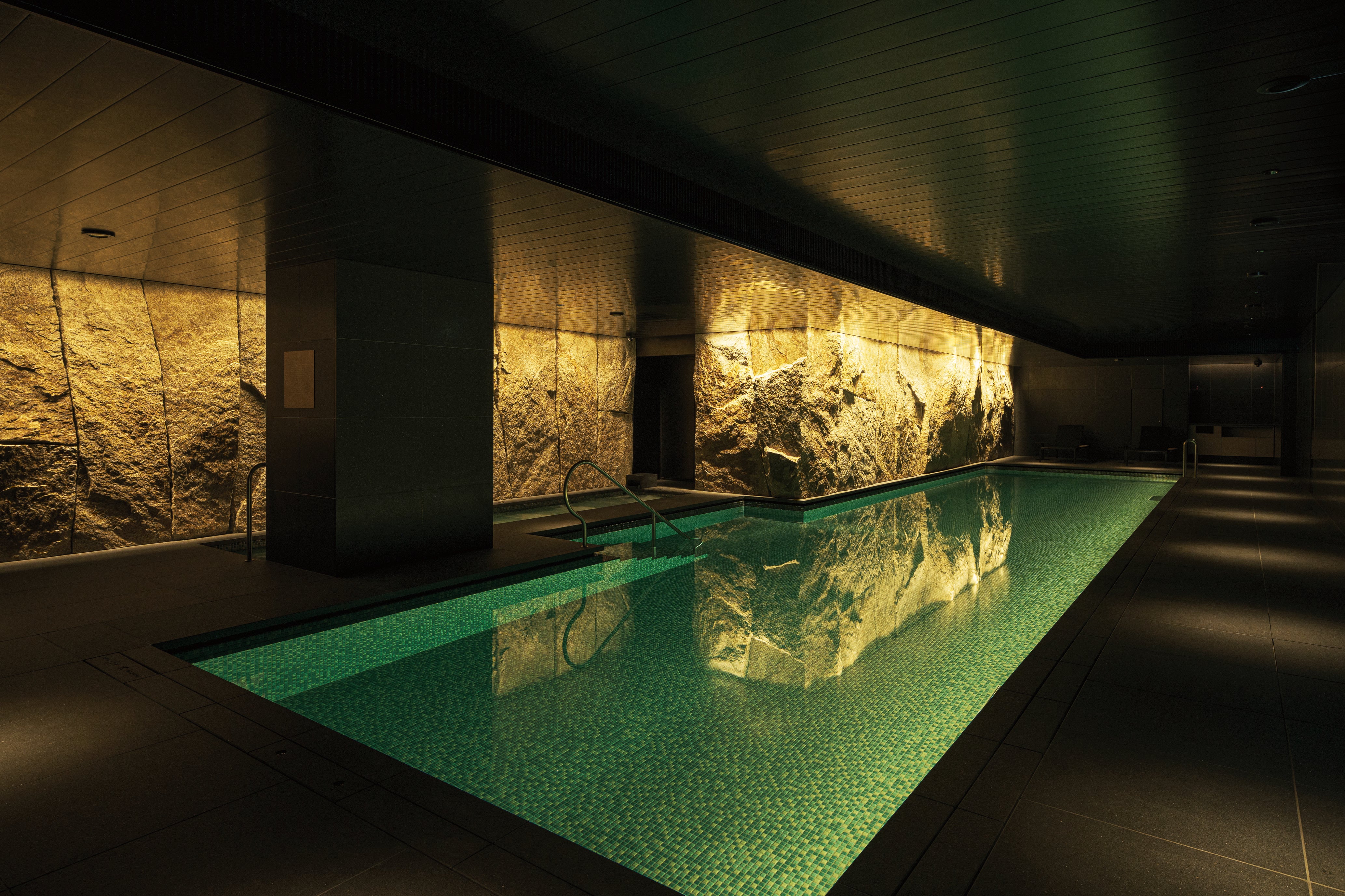 The basement pool is backed by huge rocks that come from Shikoku Island (Imperial Hotel)