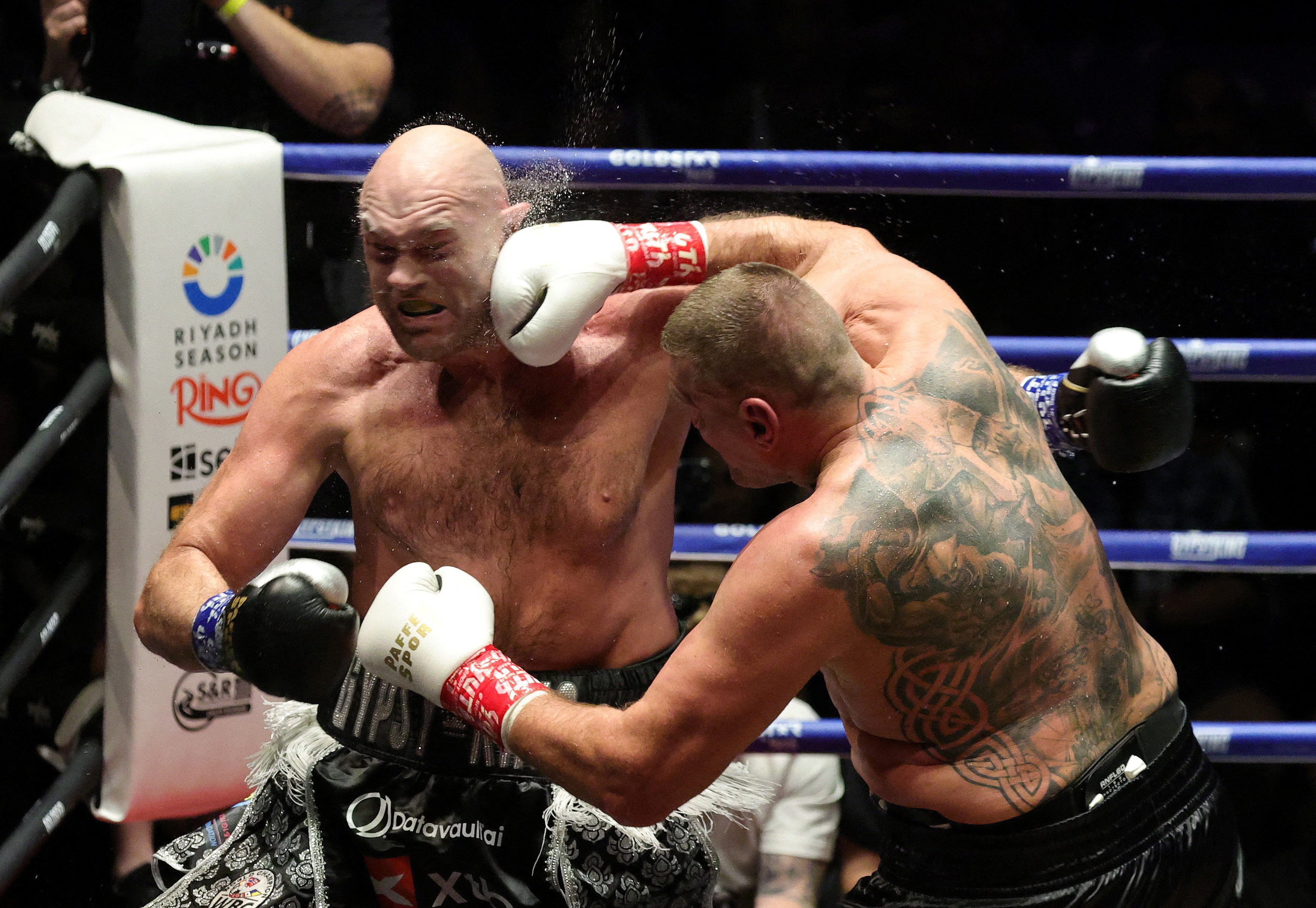 Tyson Fury (left) failed to impress against Mariusz Wach