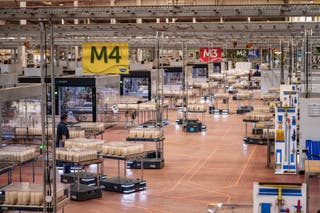 Carrybots Herbie AGVs operating in a tea packaging facility