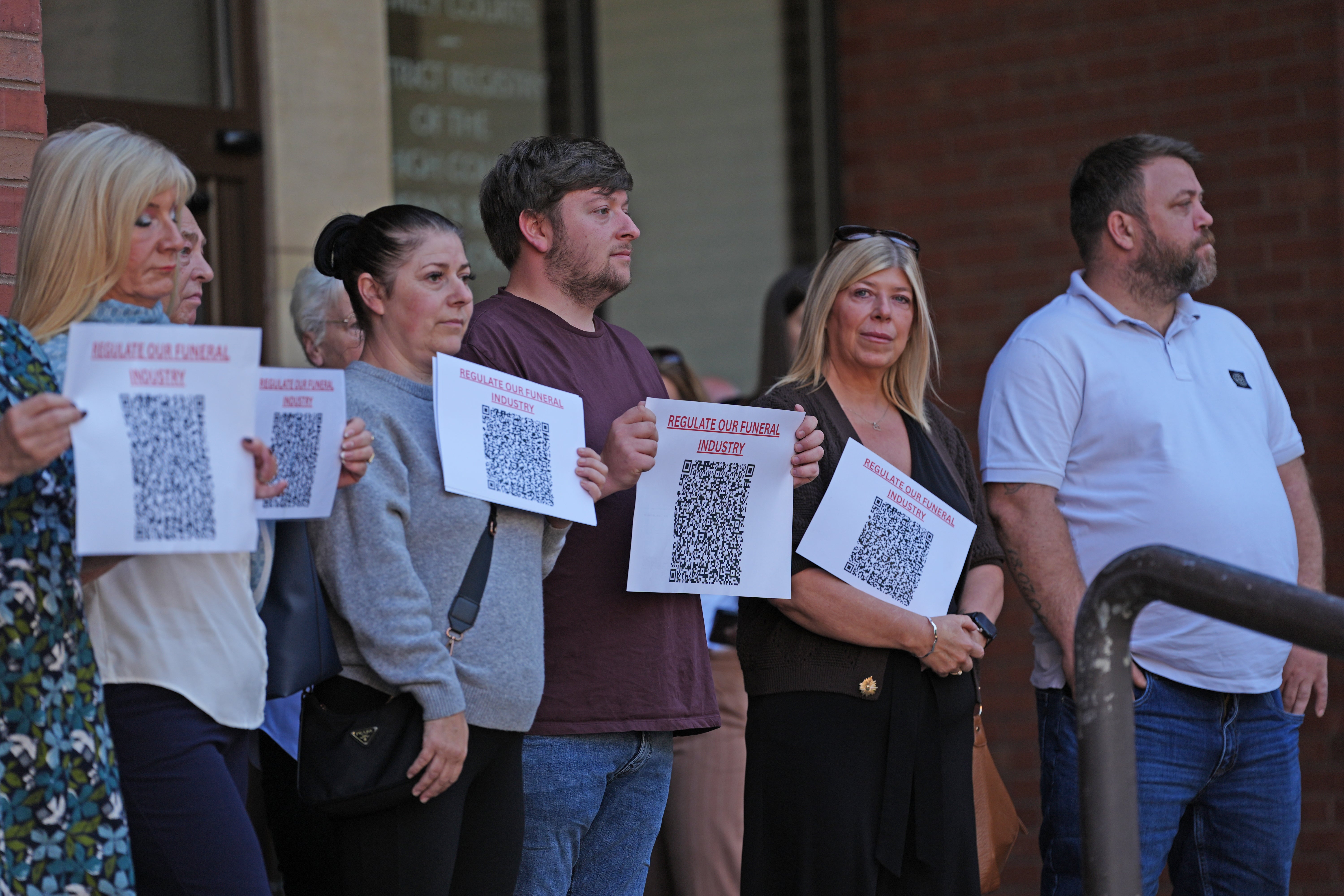 People demonstrate outside Hull Crown Court ahead of the sentencing of funeral director Robert Bush (Annabel Lee-Ellis/PA) (PA Wire)