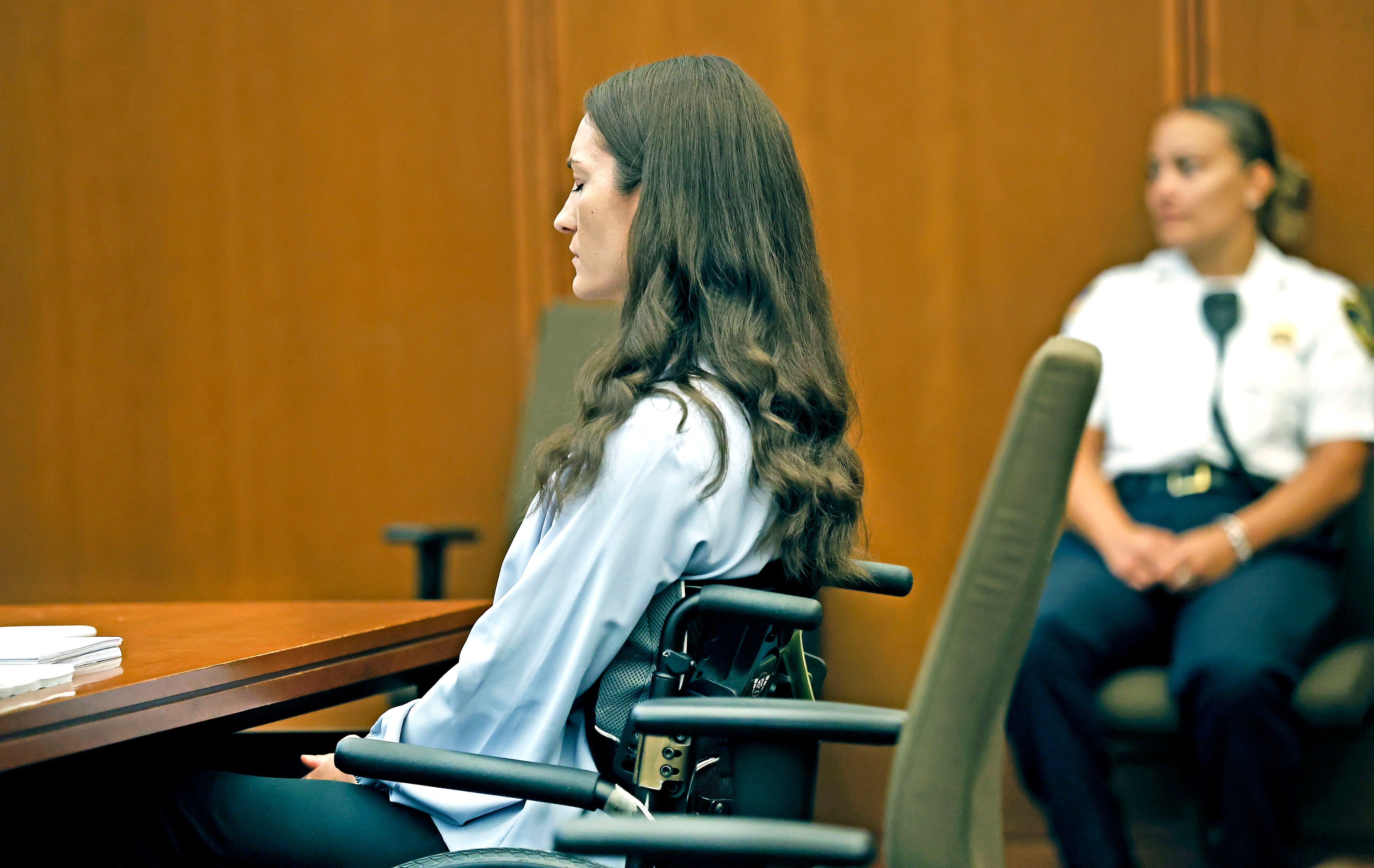 Clancy, whose suicide attempt left her paralyzed from the waist down, admits to killing her children, but her lawyer argues she was suffering from postpartum psychosis