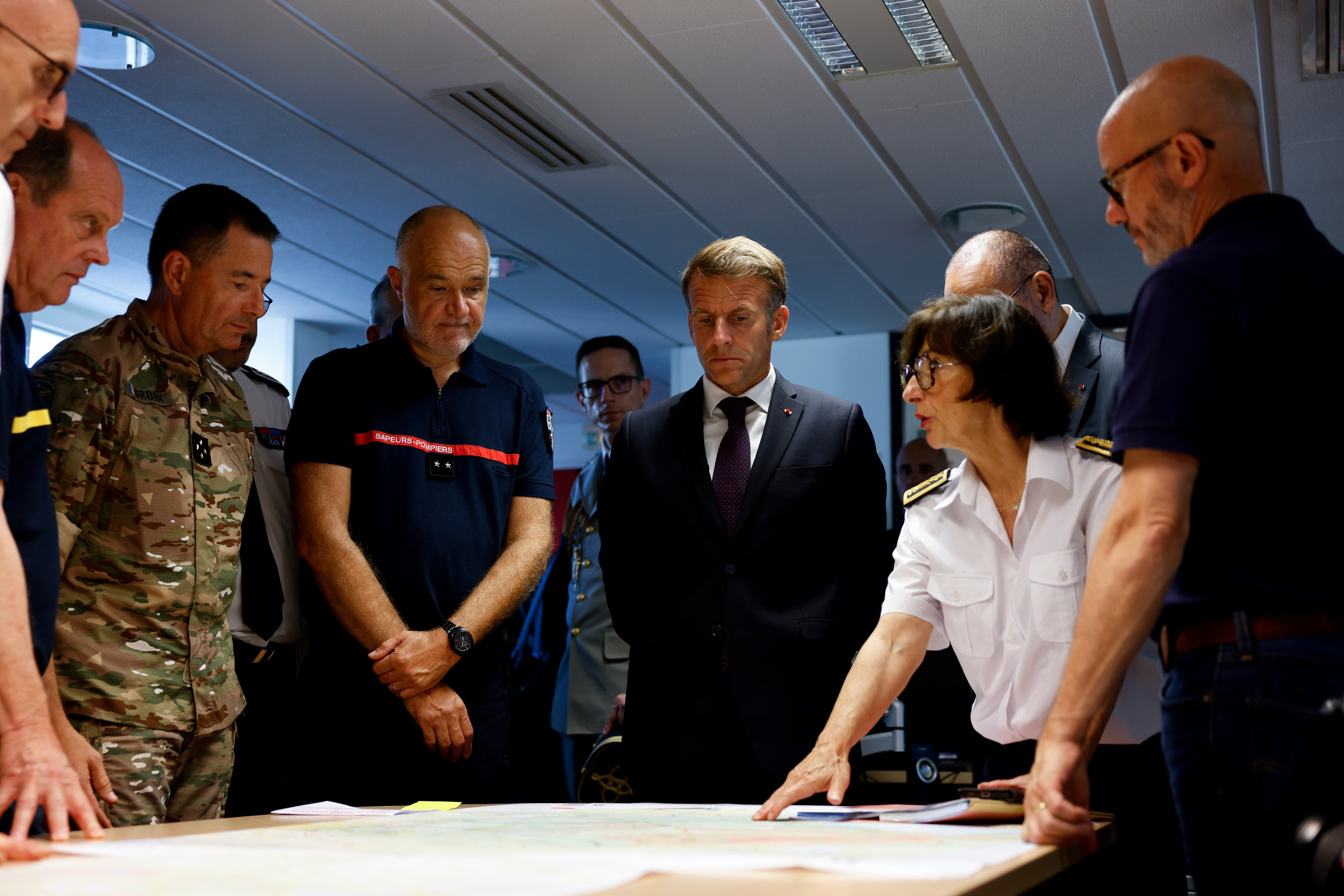 Emmanuel Macron during a situation briefing in the crisis room at the Departmental Fire and Rescue Operational Centre in Bordeaux on Monday