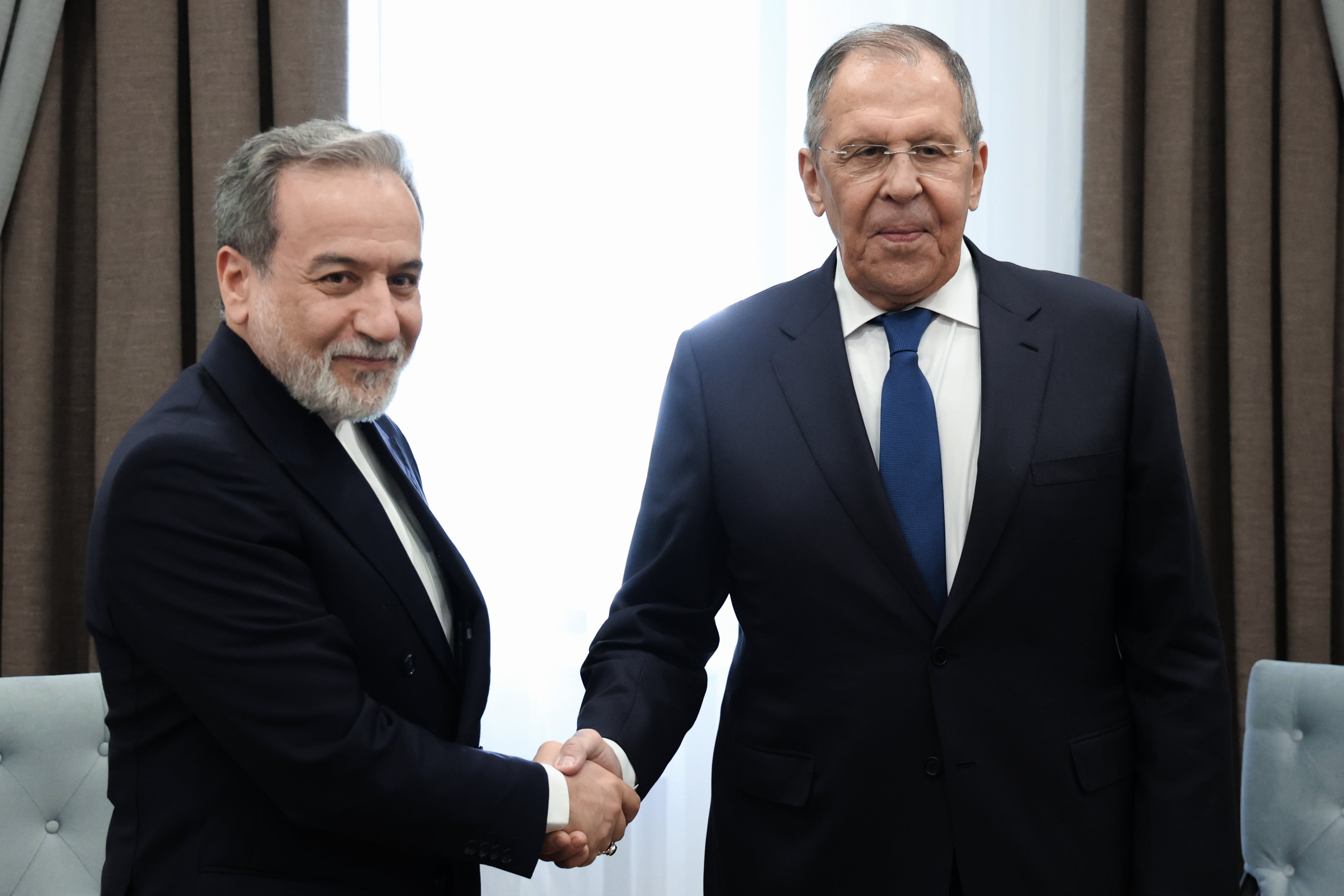 File: Russian Foreign Minister Sergey Lavrov, right, and Iranian Foreign Minister Abbas Araghchi, pose for a photo on the sidelines of a meeting on the Council of Foreign Ministers of the Shanghai Cooperation Organization (AP)
