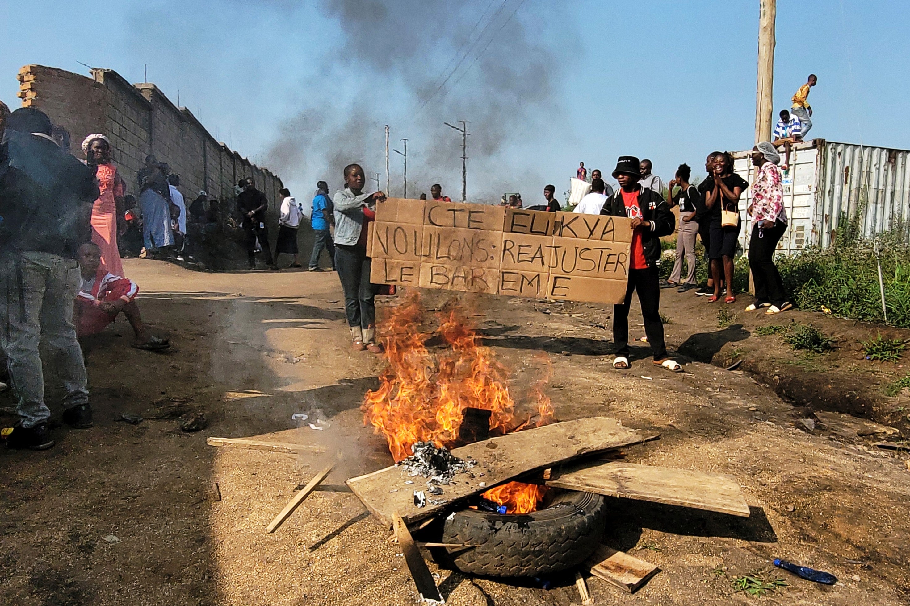 Rubble set on fire as health and frontline workers protest at the Elikya Ebola Treatment Center (Copyright 2026 The Associated Press. All rights reserved.)