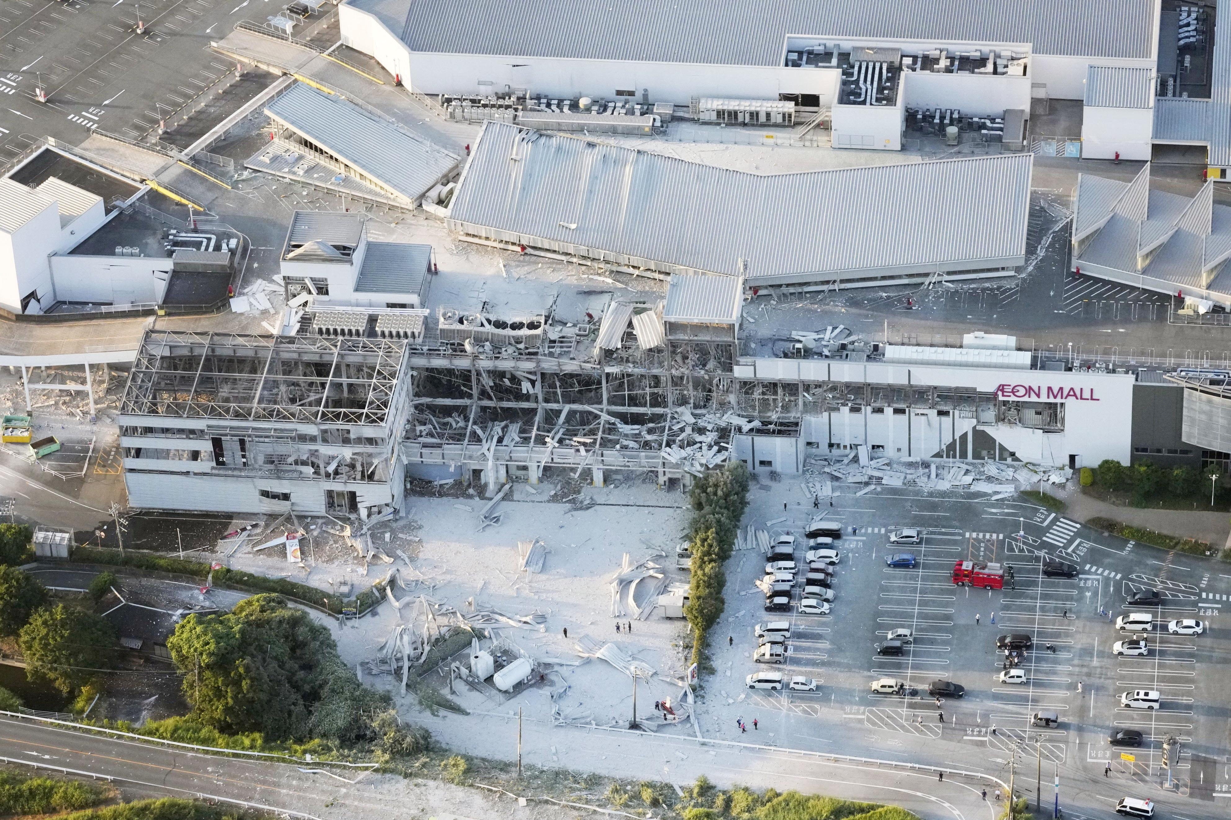 An aerial view shows the damaged Aeon Mall shopping centre after an earthquake with a preliminary magnitude of 7.1 struck Japan's southern Kumamoto prefecture (Reuters)