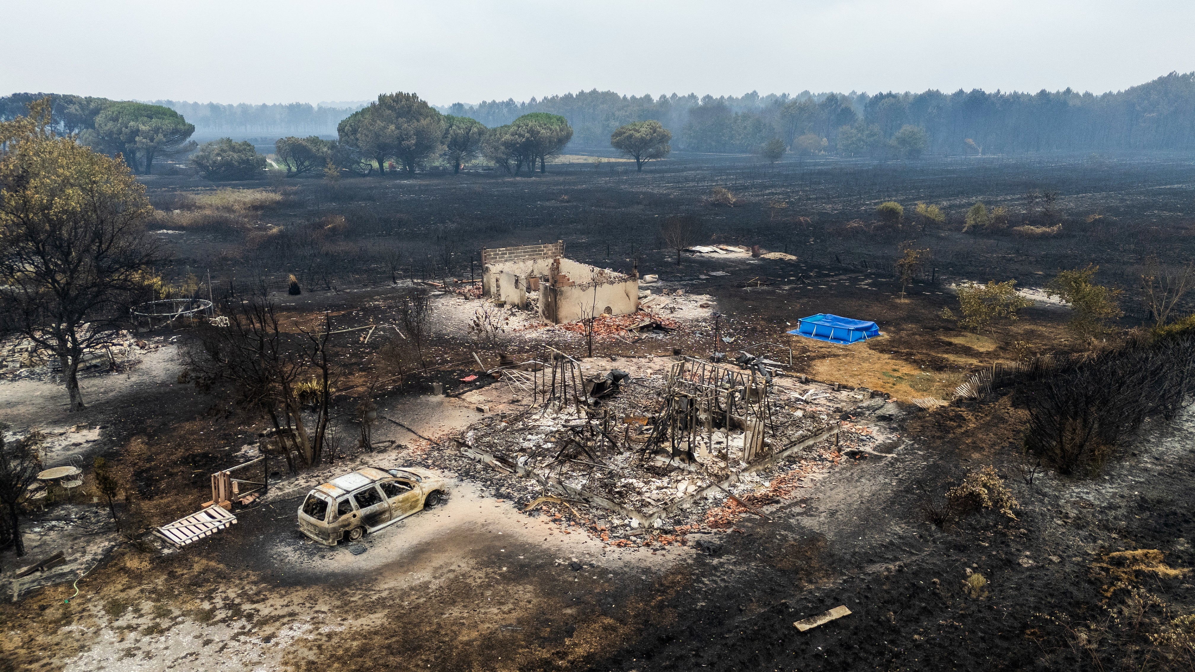 Hundreds of homes have been destroyed as the unprecedented fires have spread. Pictured is a burned out residence in Le Porge, Gironde