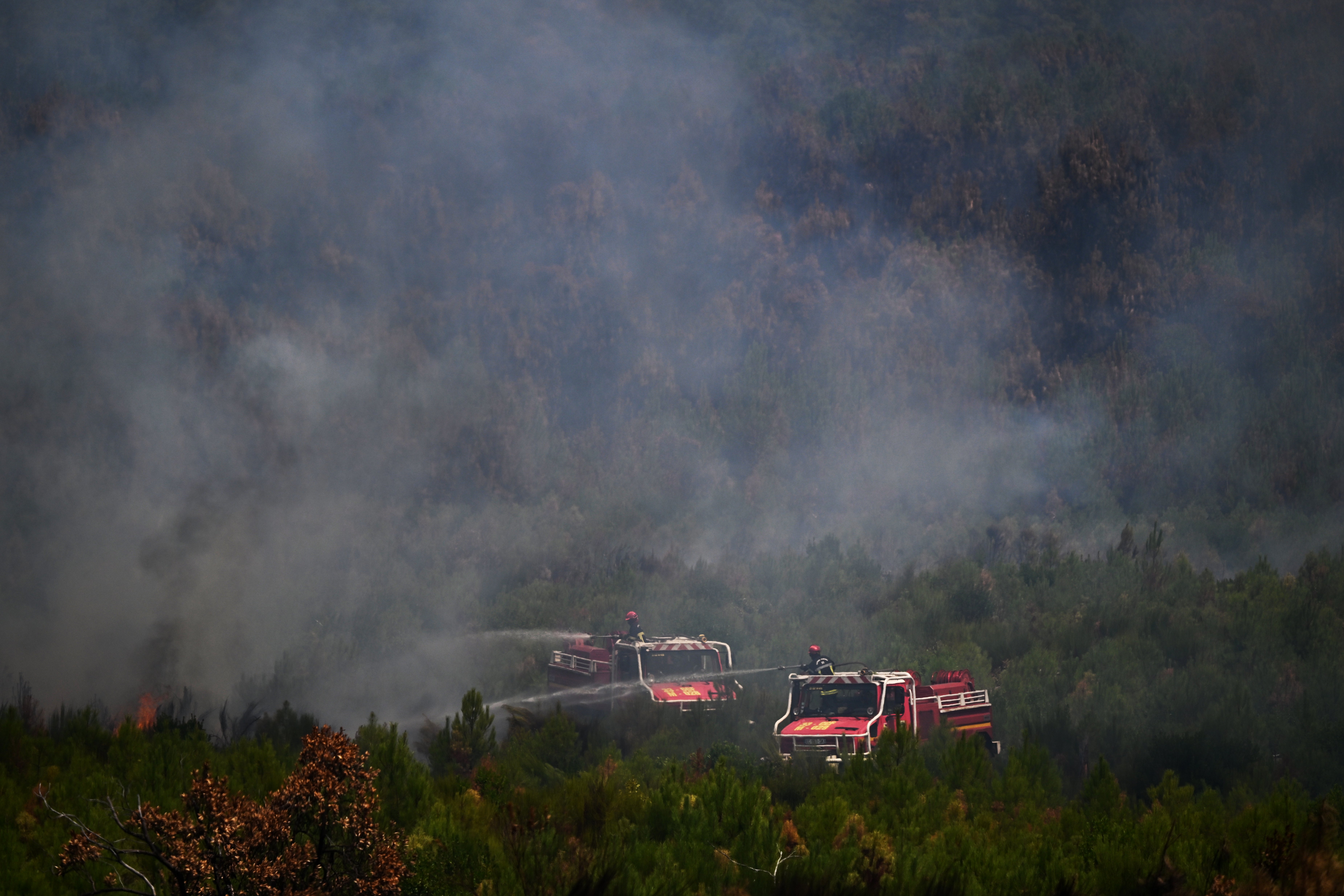 The fires in Gironde continue to produce thick smoke across the region (AP)