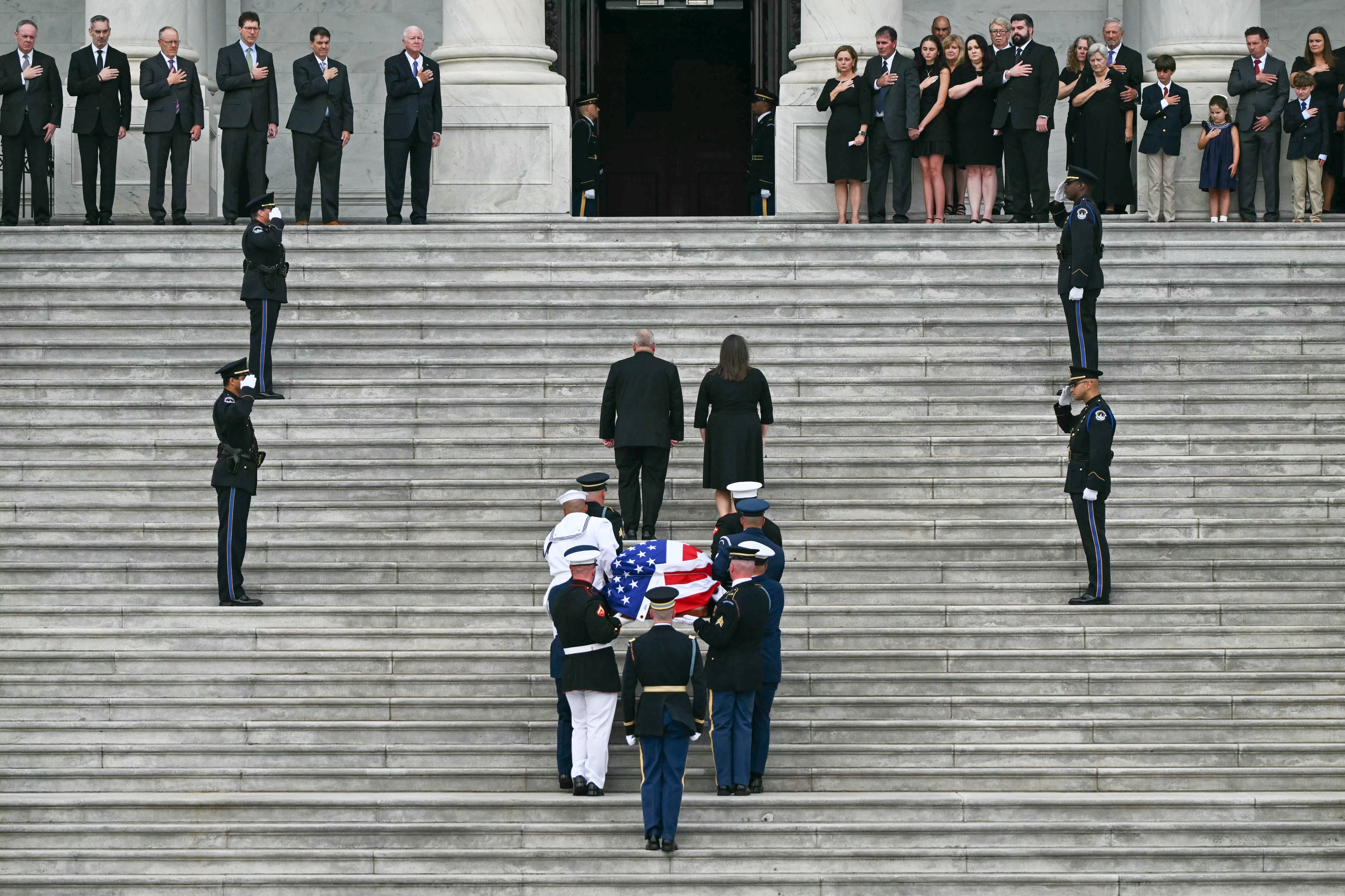 A US military honor guard carries the casket of the late US Senator Lindsey Graham upon arrival for a Congressional tribute to Graham at the US Capitol (AFP via Getty Images)