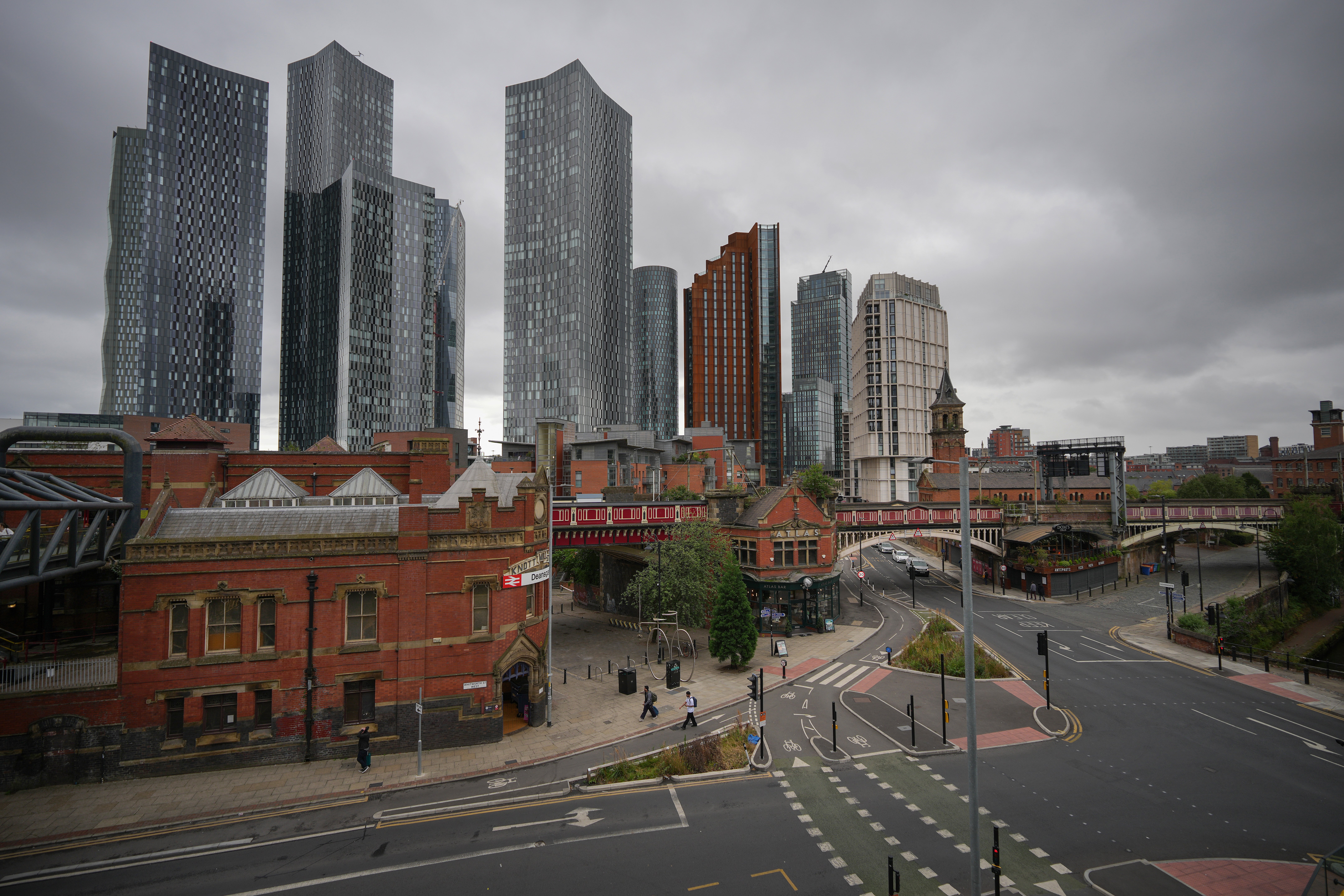 The Victorian grandeur of Deansgate Station mixes with high rise modern architecture of central Manchester (Getty)