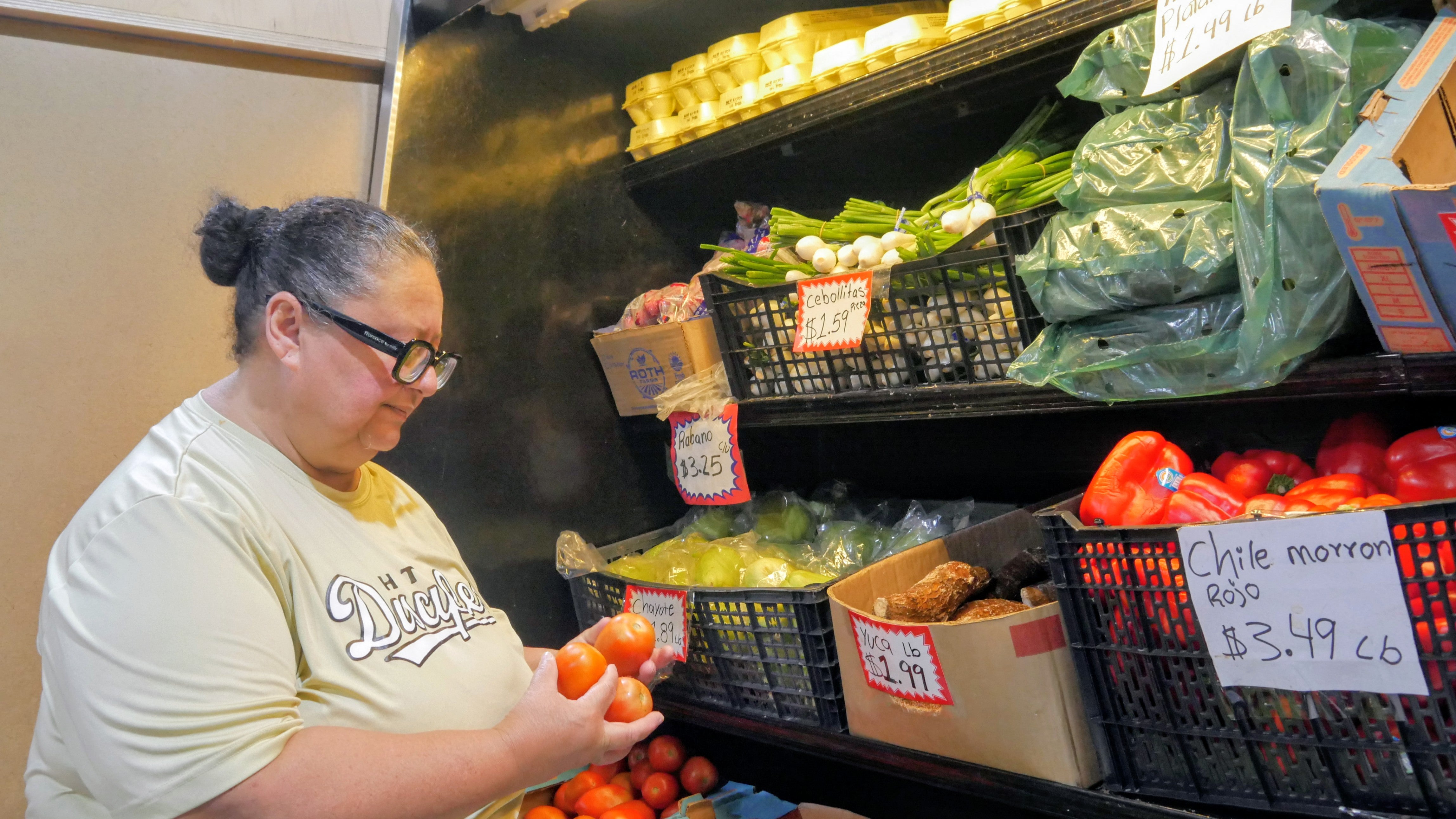 References to gas prices were down slightly but respondents' mention of food and grocery prices increased (AP)
