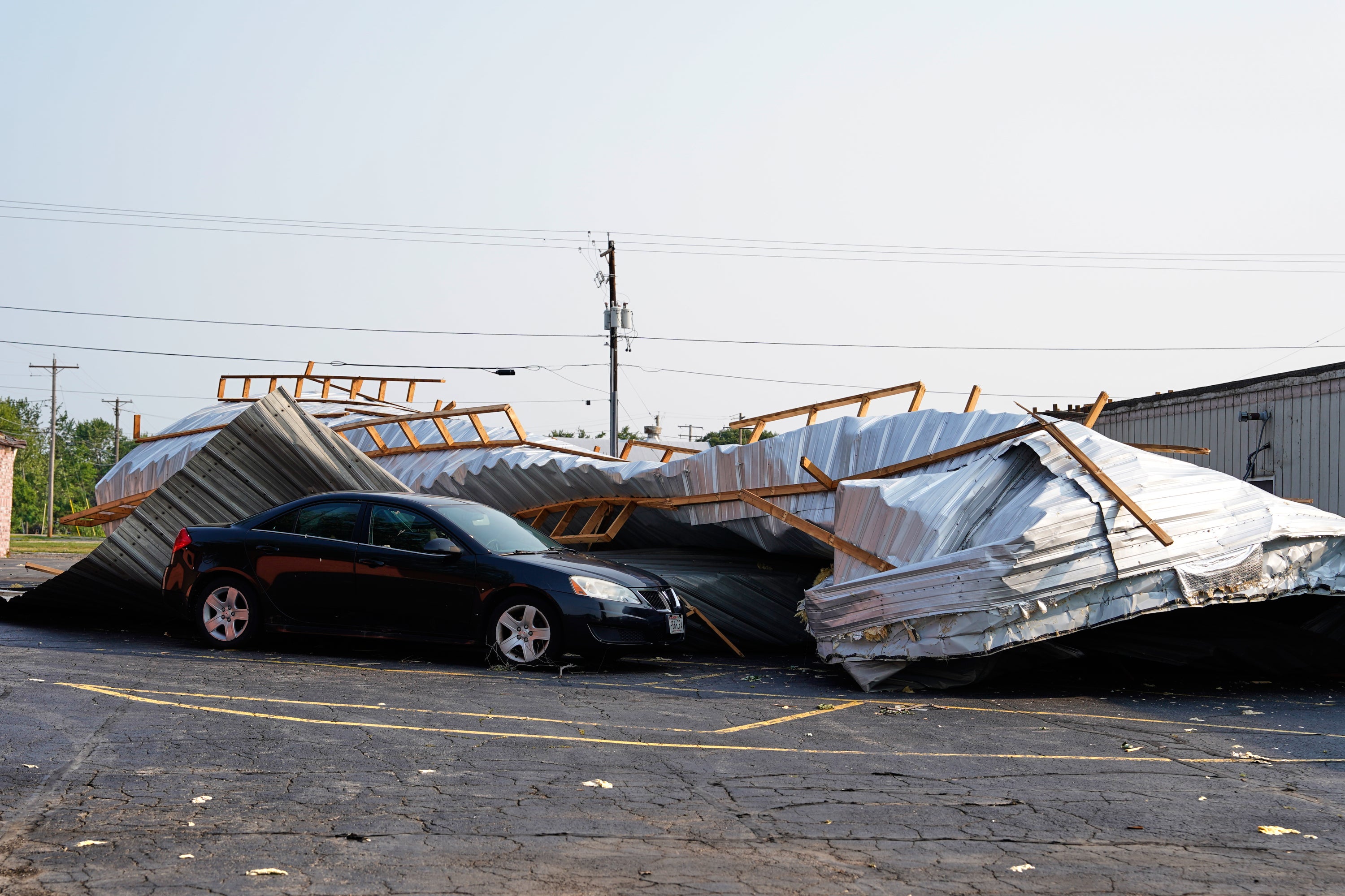 Preliminary data indicated it was an EF3, meaning it packed winds of 136-165 mph (219-266 kph) (AP Photo/Kayla Wolf)