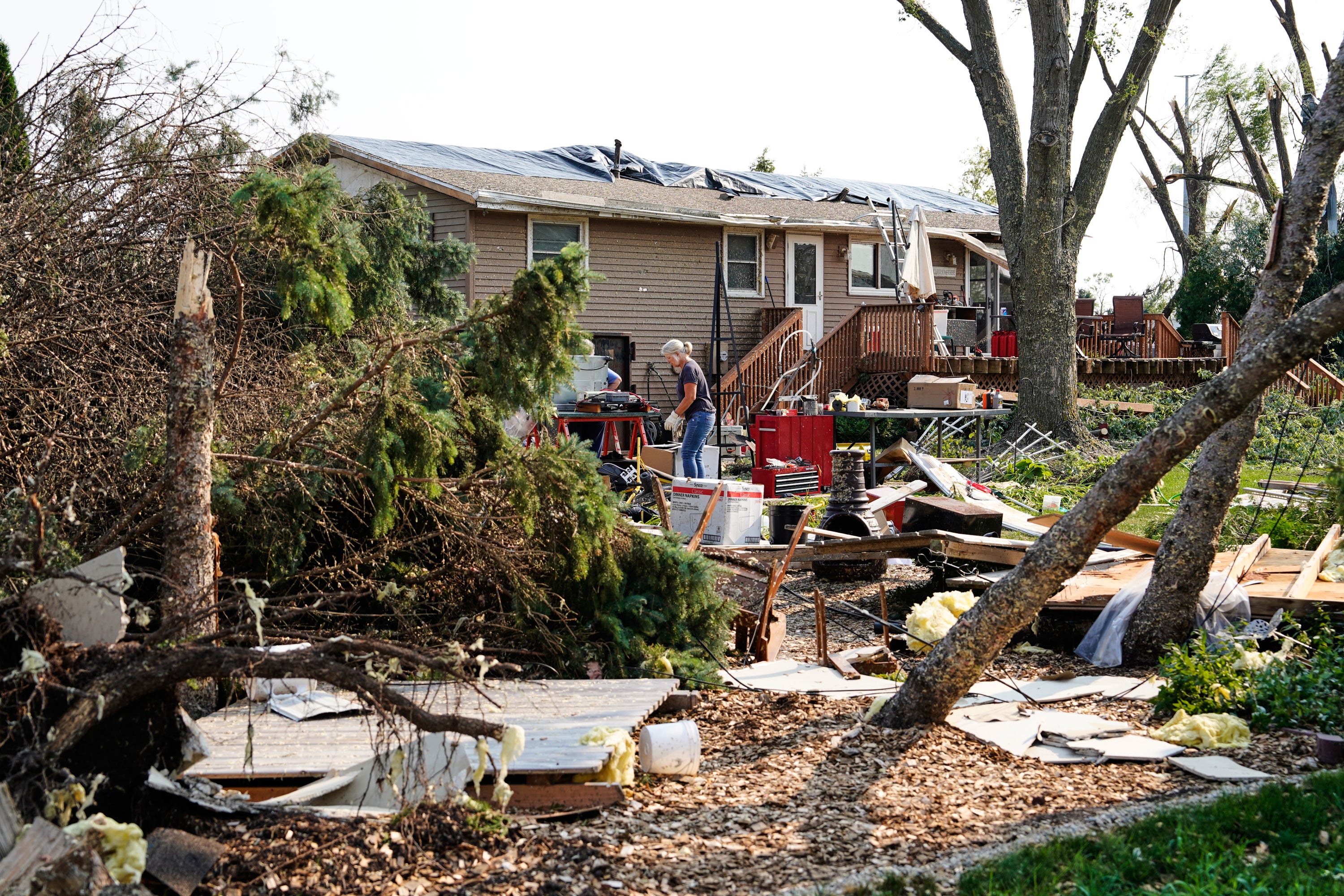 The tornado remained on the ground for about 12 miles (AP Photo/Kayla Wolf)