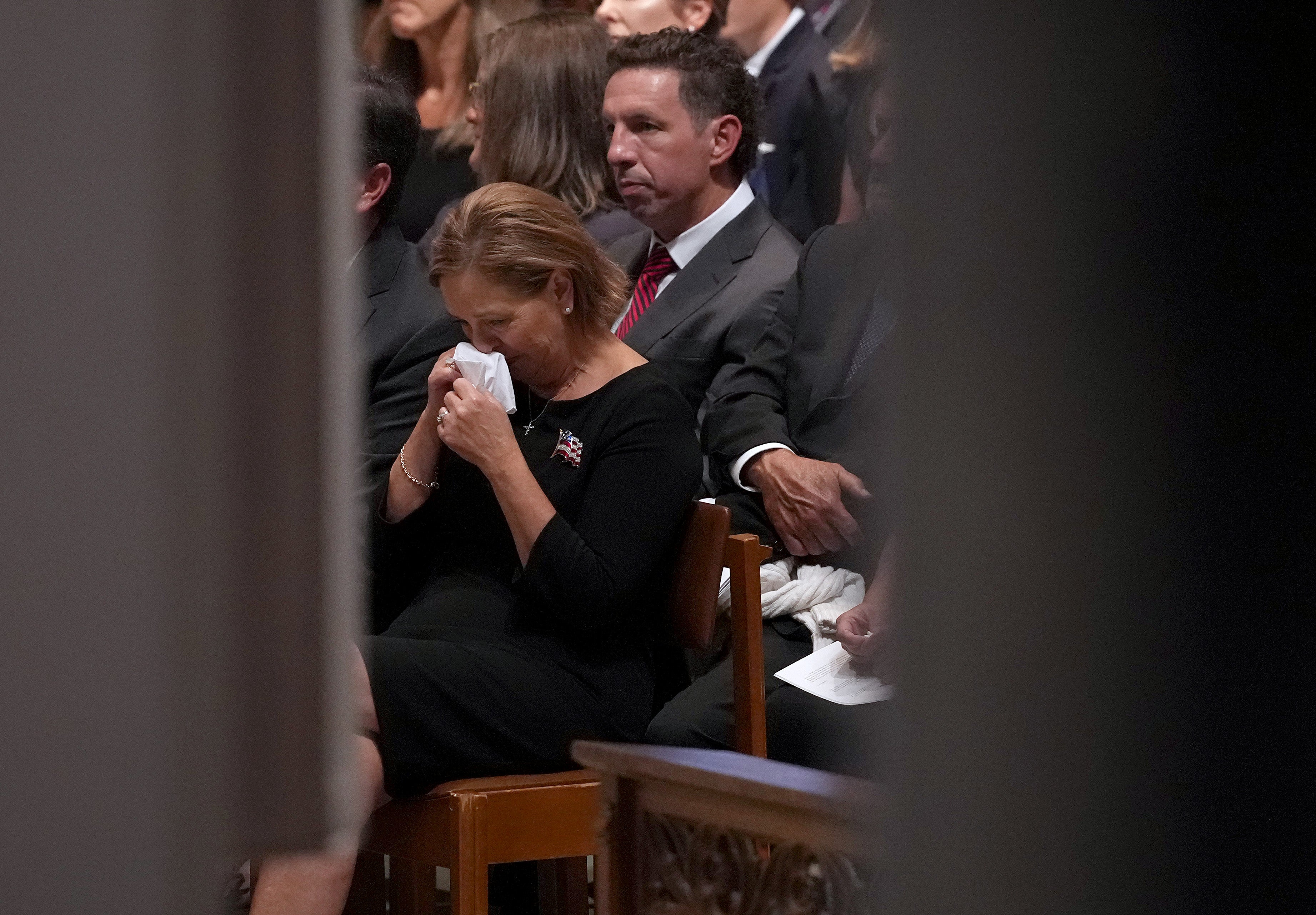 Sen. Darline Graham Nordone wipes her nose during the funeral service for the late Sen. Lindsey Graham