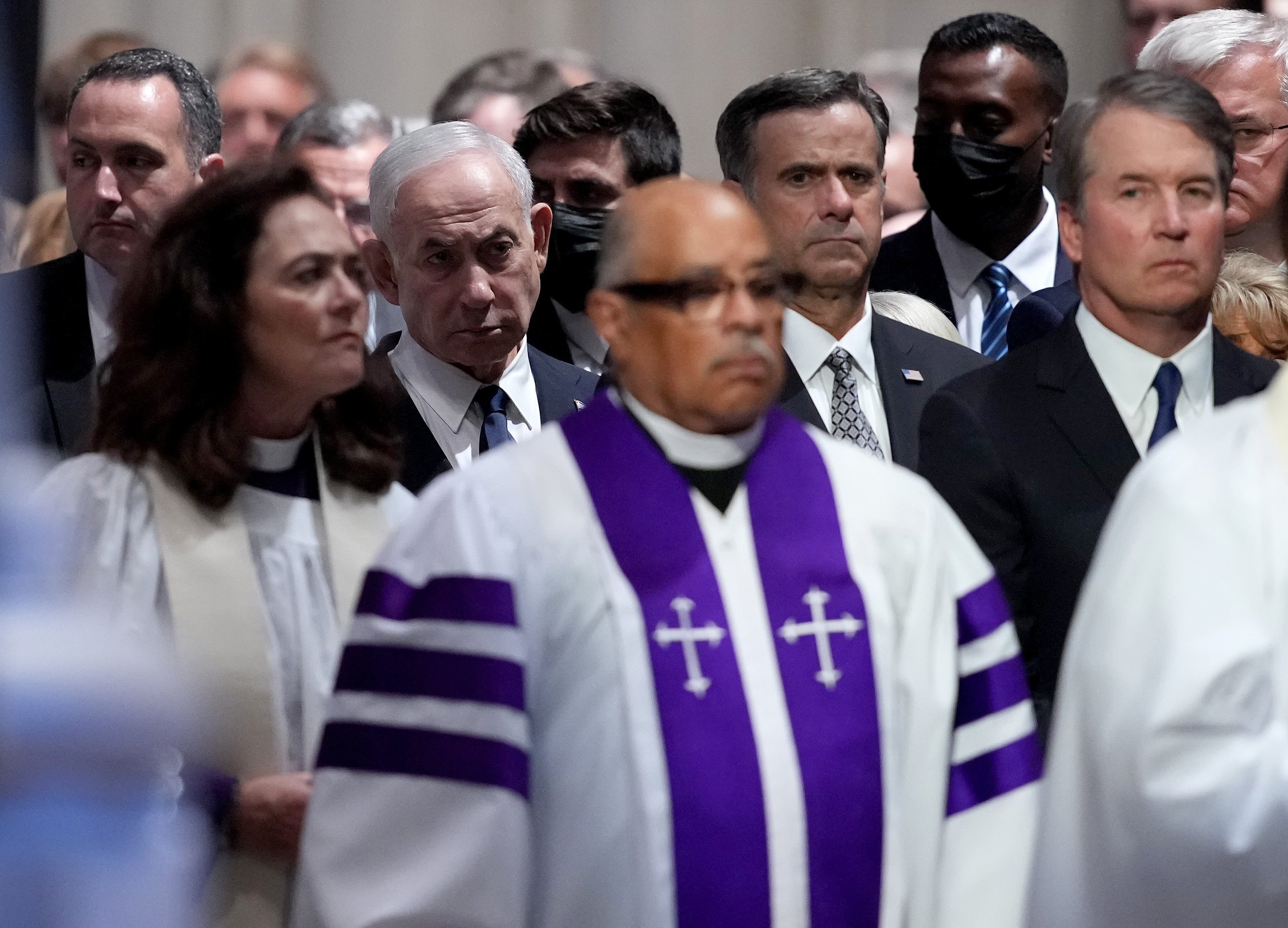 Israeli Prime Minister Benjamin Netanyahu, Central Intelligence Agency Director John Ratcliffe, and Supreme Court Associate Justice Brett Kavanaugh watch the procession at the funeral service