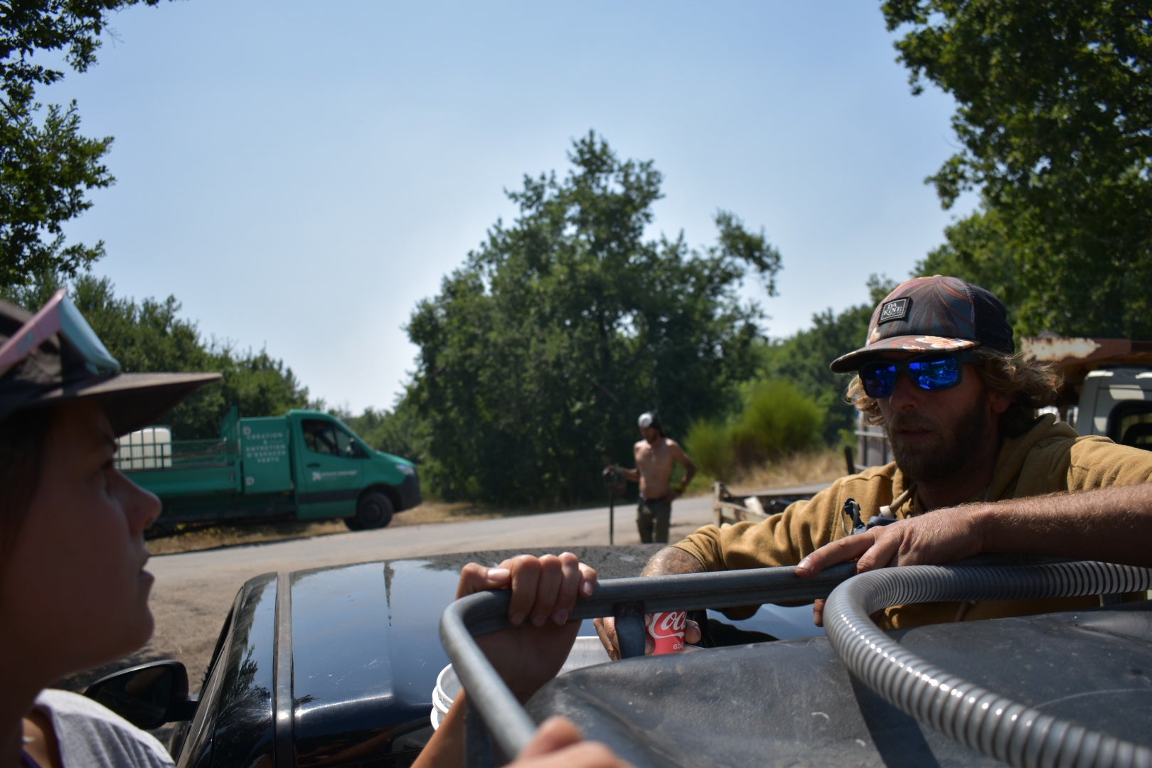 A ride out patrol sets off from the canal to head into the forests, still partially ablaze and blackened by the wildfires