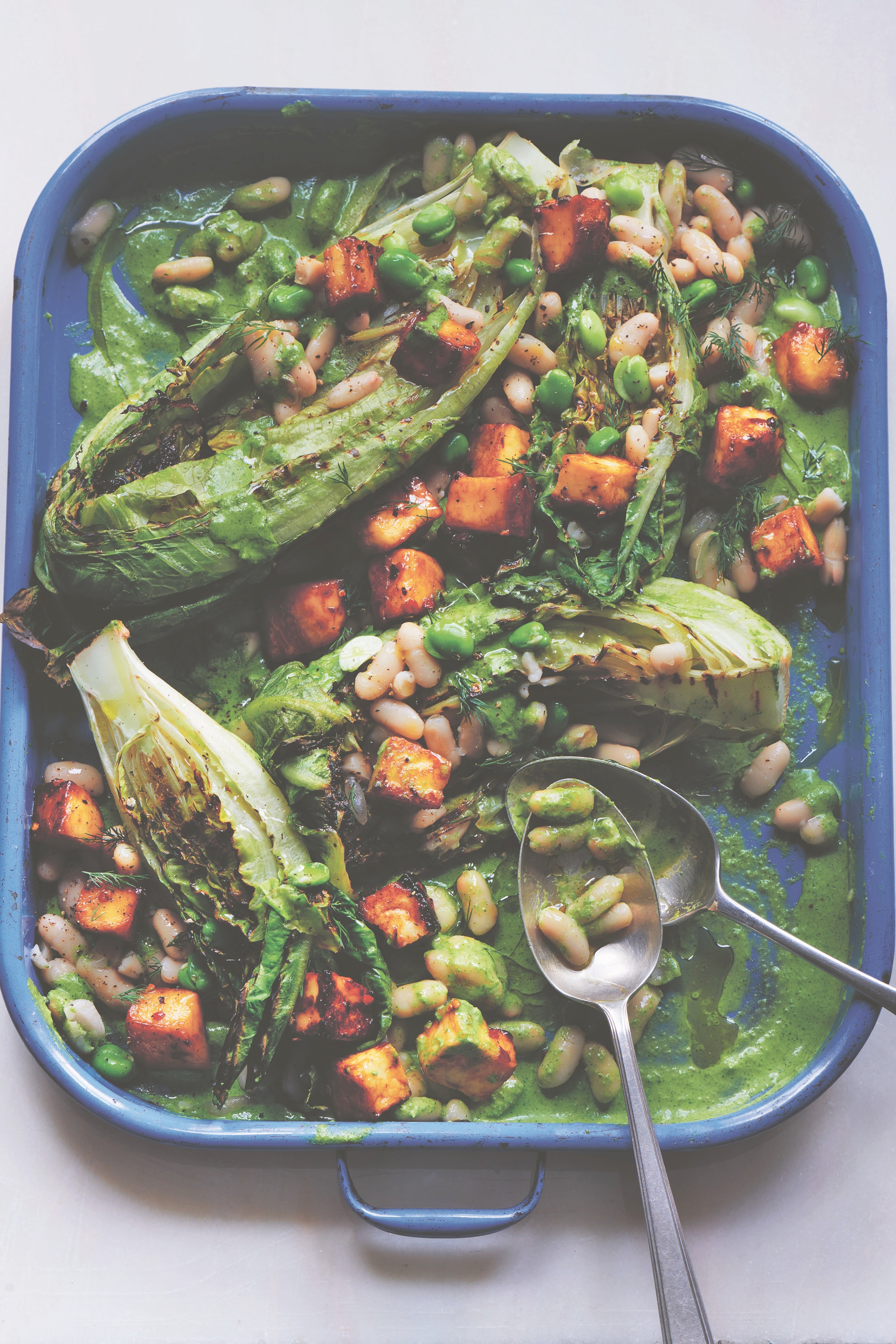 Honey-glazed halloumi and white beans turn this charred lettuce salad into dinner
