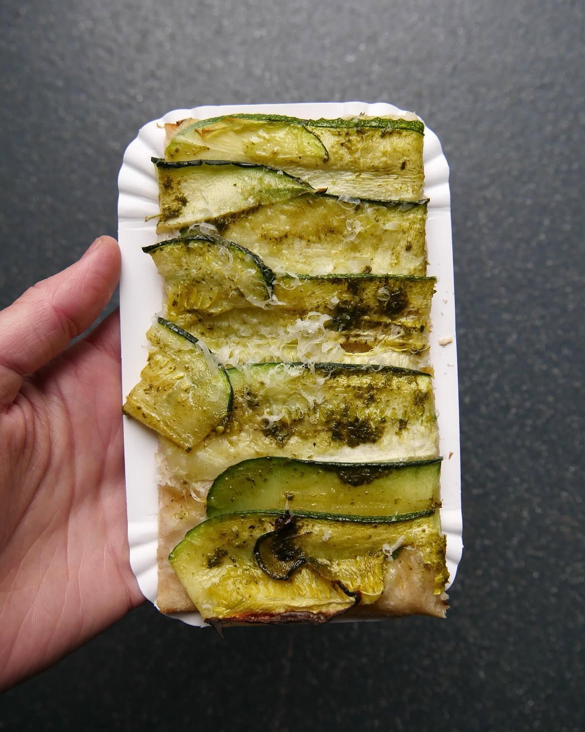 A lighter pizza where thin courgettes soften beneath plenty of parmesan