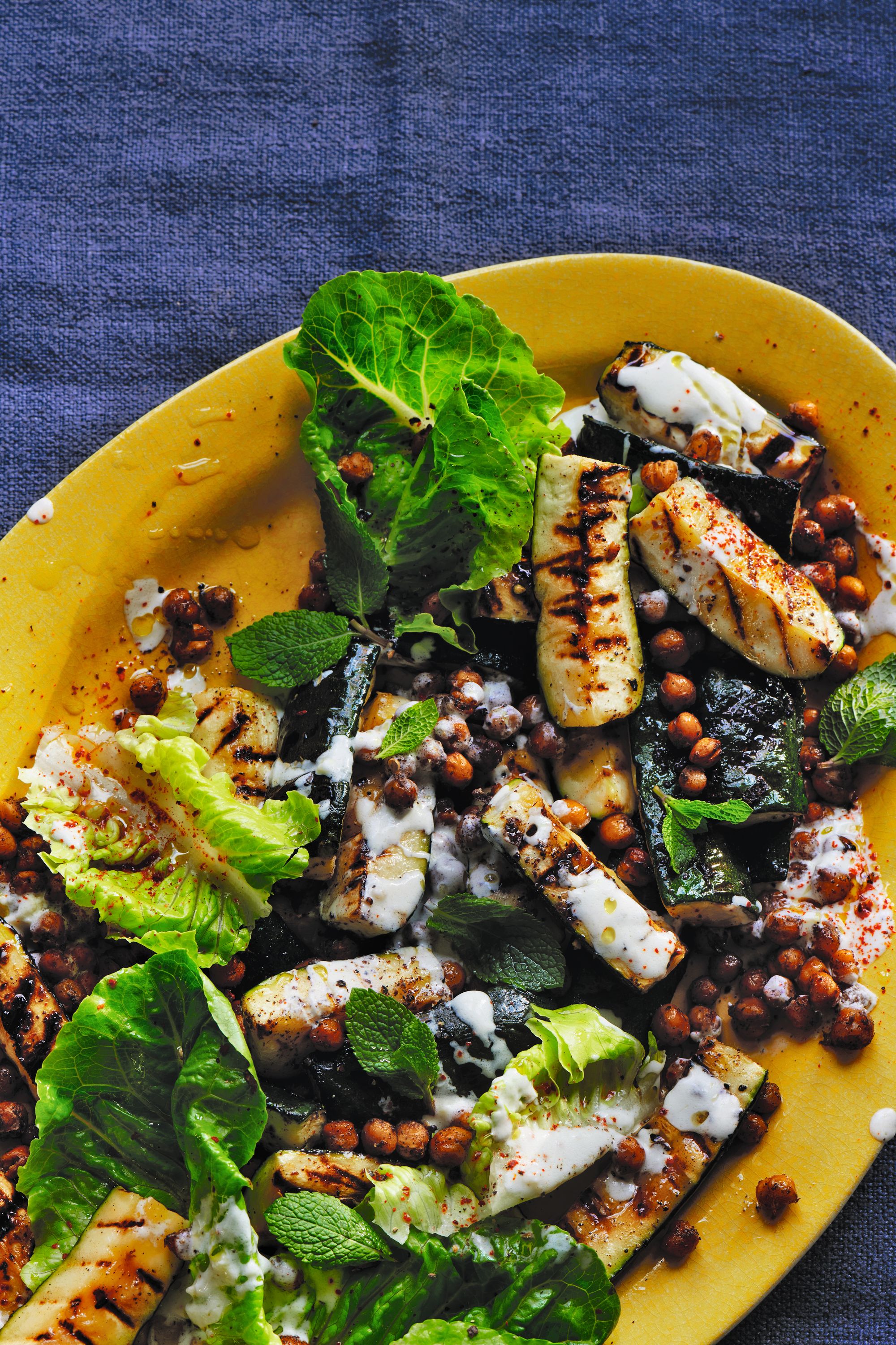 Sumac-roasted chickpeas bring crunch to smoky courgettes and lemony yoghurt