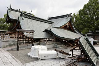 The collapsed worship hall of Yatshushiro Shrine after an earthquake with a magnitude of 7.1 struck Japan's southern Kumamoto prefecture