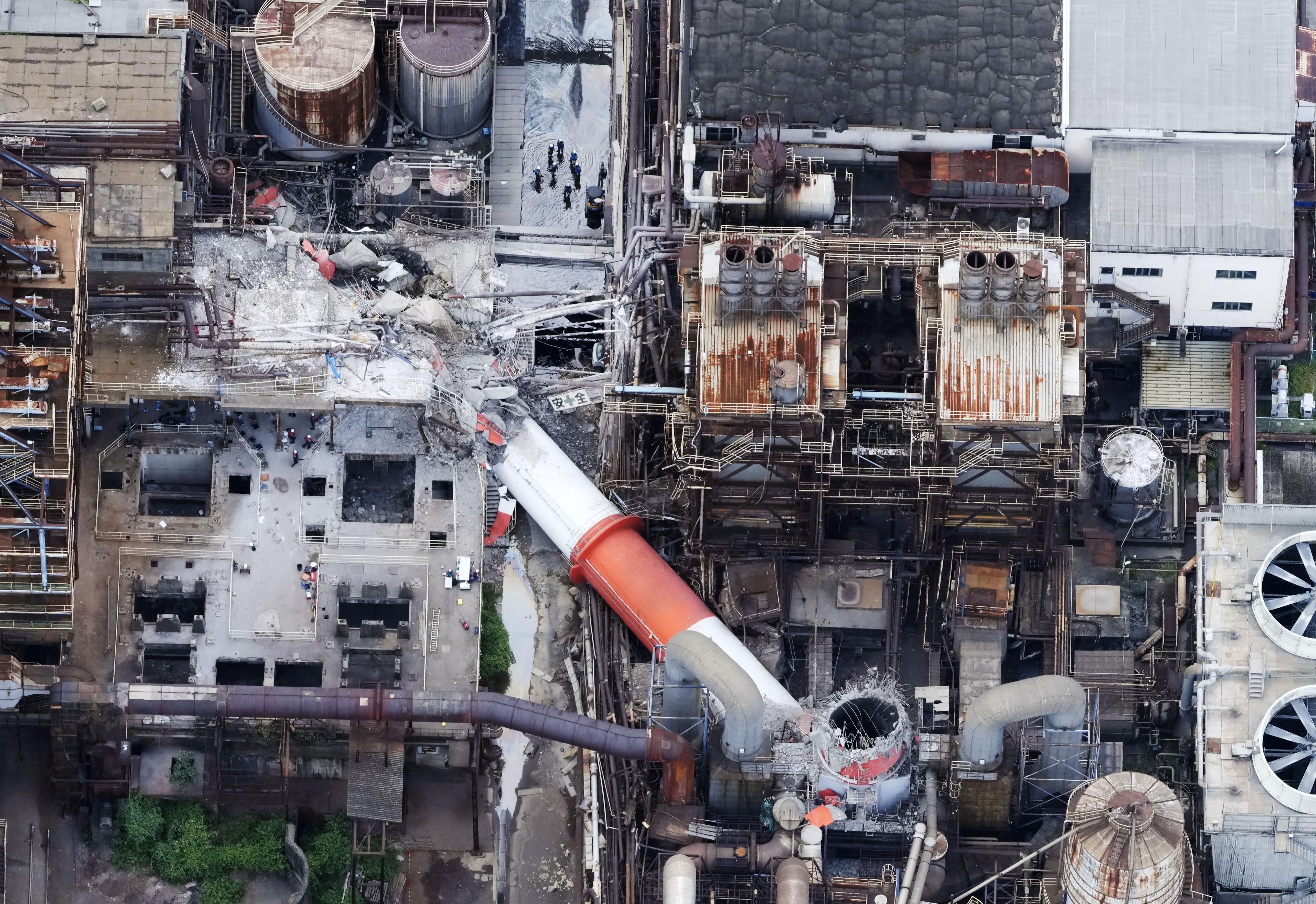 This aerial image shows a damaged chimney of the Nippon Paper Industries Co.’s Yatsushiro factory, following an earthquake in Yatsushiro, Kumamoto