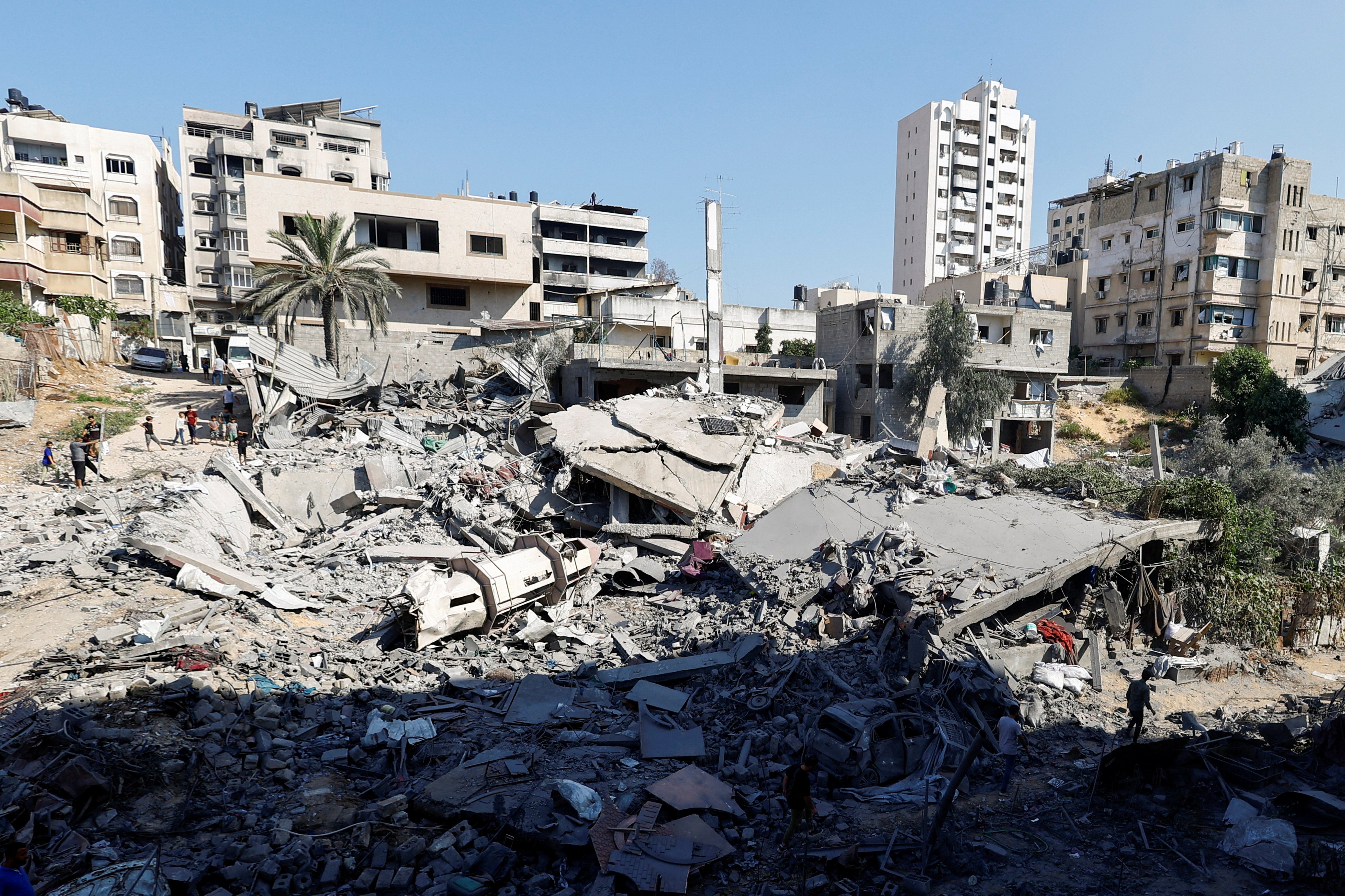 Palestinians inspect a site of an Israeli strike on a Mosque that was pre-warned by the Israeli military to evacuate on Tuesday, in Gaza City, July 29, 2026 (Reuters)
