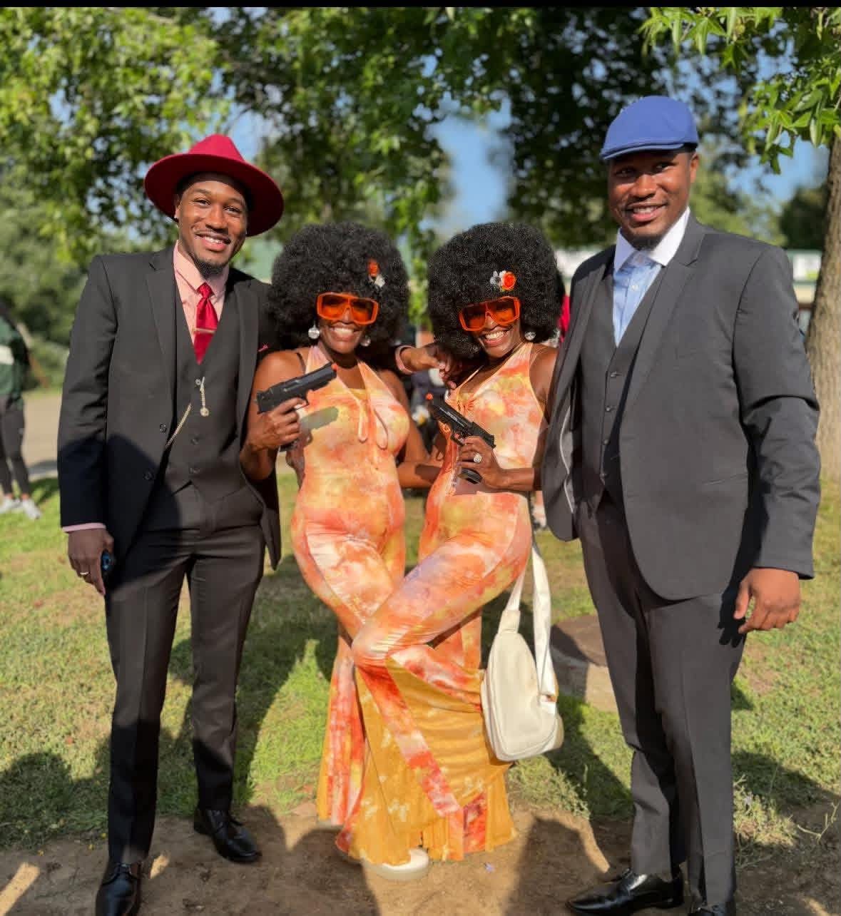One of Laquala’s favorite themes throughout her years of attending the Twins Days Festival was during last year’s 50th anniversary, where the sisters dressed in ‘70s-era clothes. The sisters are pictured here with another set of twins, Semmie and Sammie.