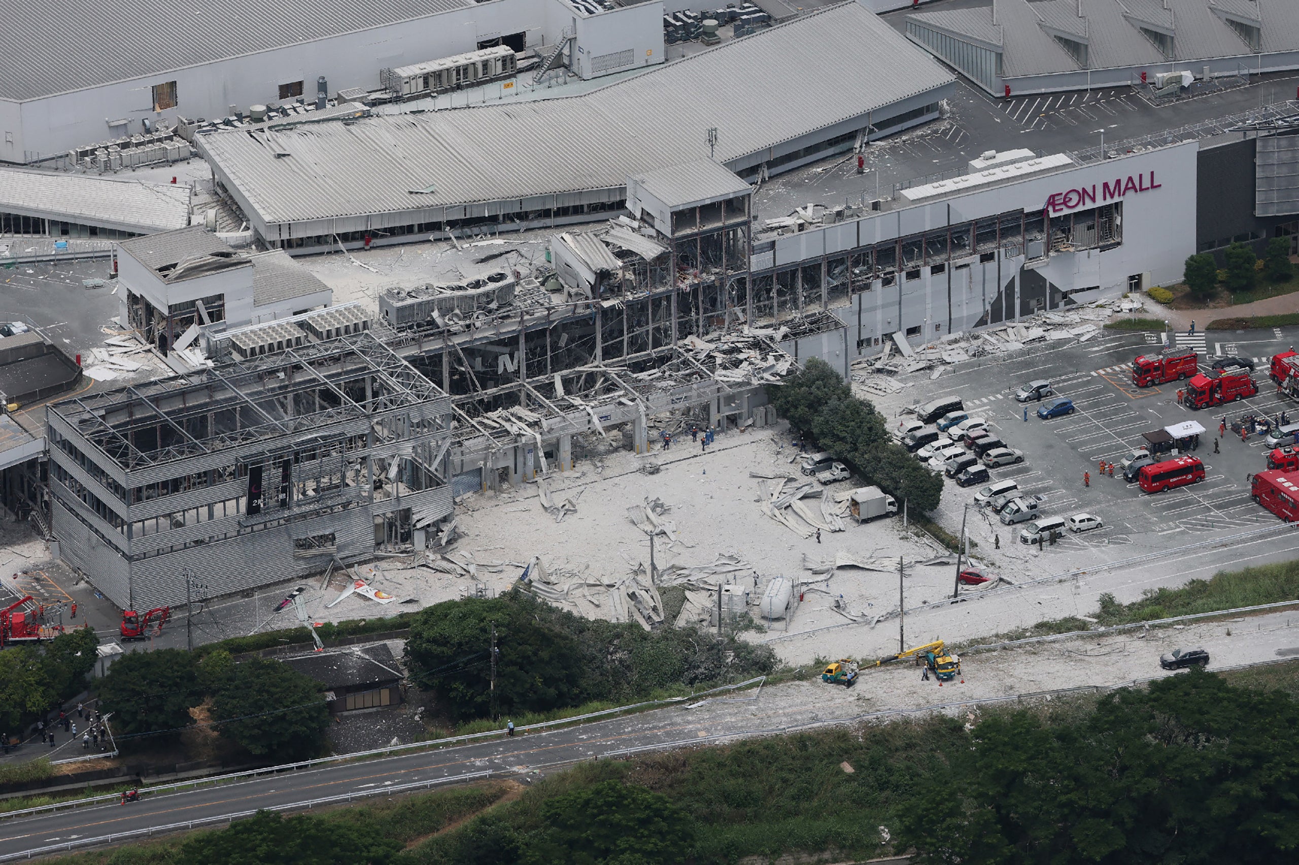 An aerial view shows rescue workers at Nippon Paper Industries factory after an earthquake with a preliminary magnitude of 7.1 struck Japan's southern Kumamoto prefecture, in Yatsushiro City, Kumamoto Prefecture (AFP/Getty)