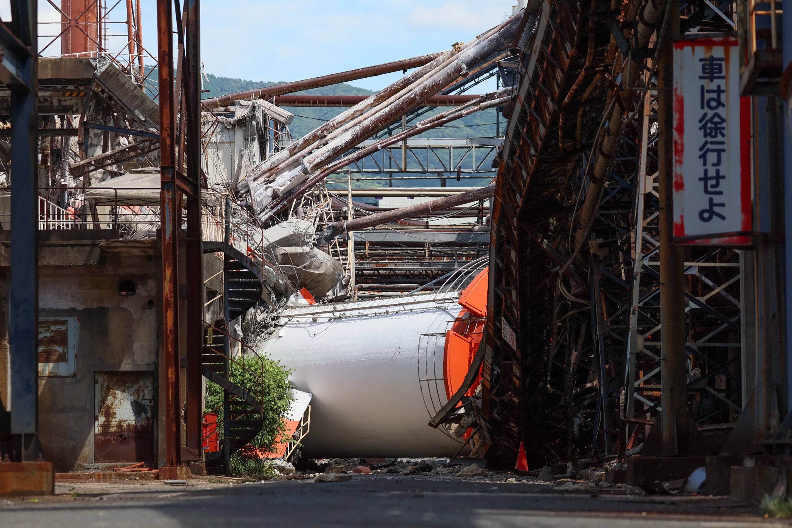 A collapsed chimney is seen inside the Nippon Paper Industries' Yatsushiro Mill, in Yatsushiro (AFP/Getty)