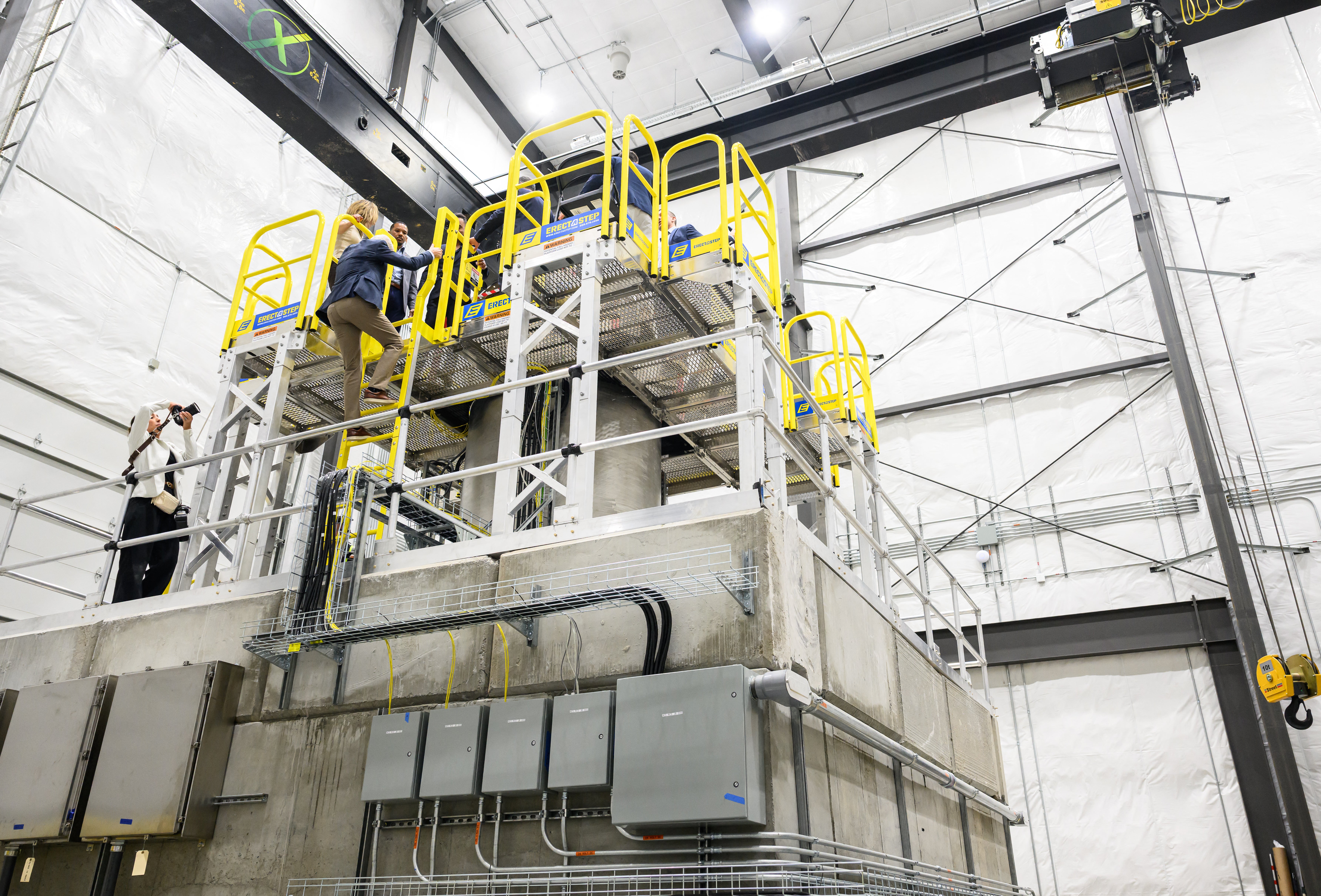 US Secretary of Energy Chris Wright climbs atop a nuclear reactor at Aalo Atomics facility during a tour of the Idaho National Laboratory in an area west of Idaho Falls, Idaho, on June 25, 2026 (Photo by Josh Edelson / AFP via Getty Images)