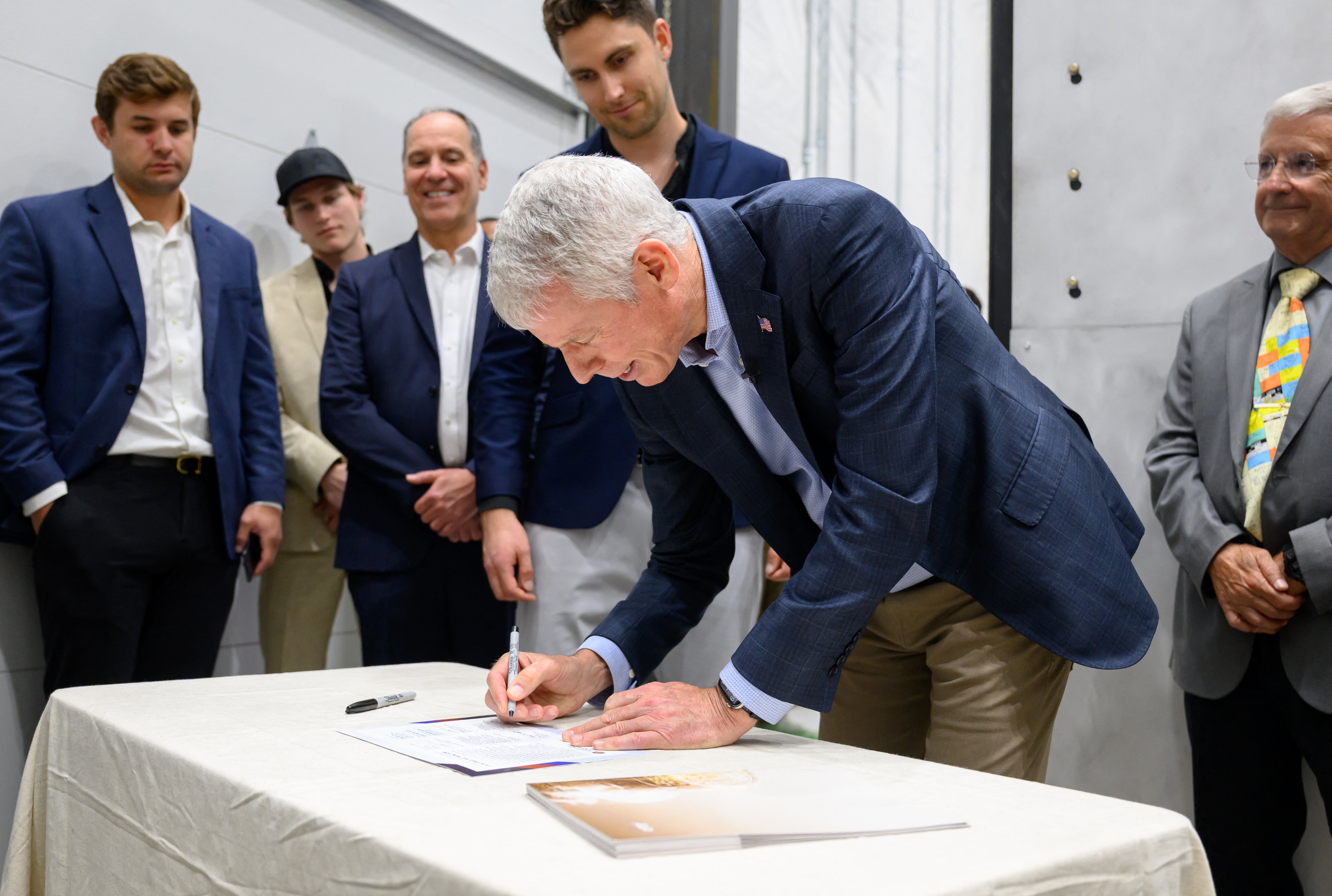 US Secretary of Energy Chris Wright signs an authorisation for Aalo Atomics to start their nuclear reactor during a tour of the Idaho National Laboratory in an area west of Idaho Falls, Idaho, on June 25, 2026 (Photo by Josh Edelson / AFP via Getty Images)