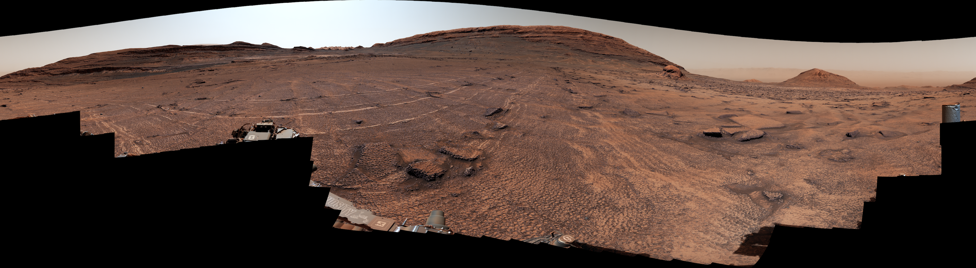 The Martian terrain is covered in mysterious polygons in this panoramic image from the rover
