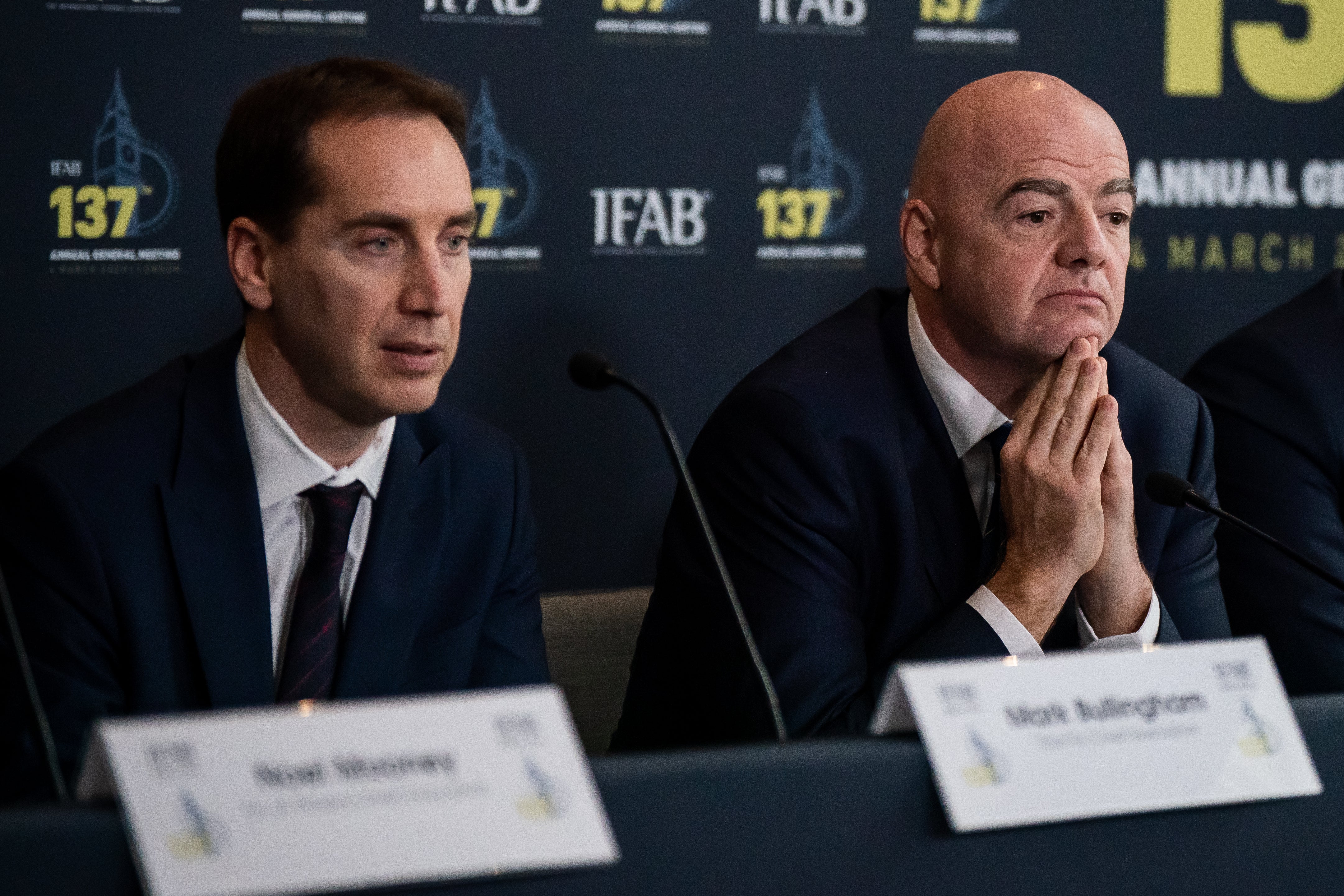 FA chief executive Mark Bullingham next to Infantino in 2023 (PA)