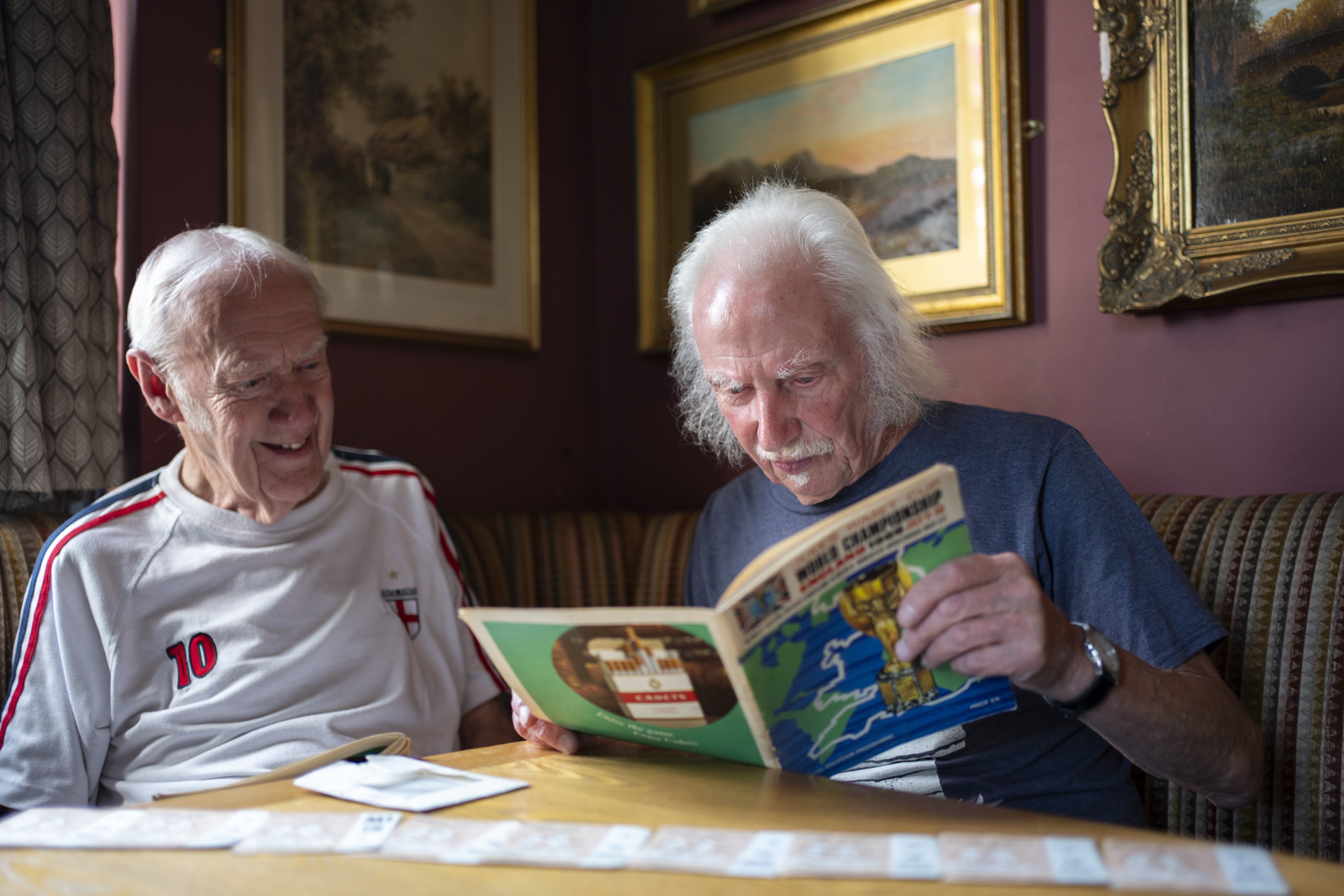 Norman Cooper and Ray Liberty look at World Cup memorabilia (Ben Whitley/PA) (PA Wire)