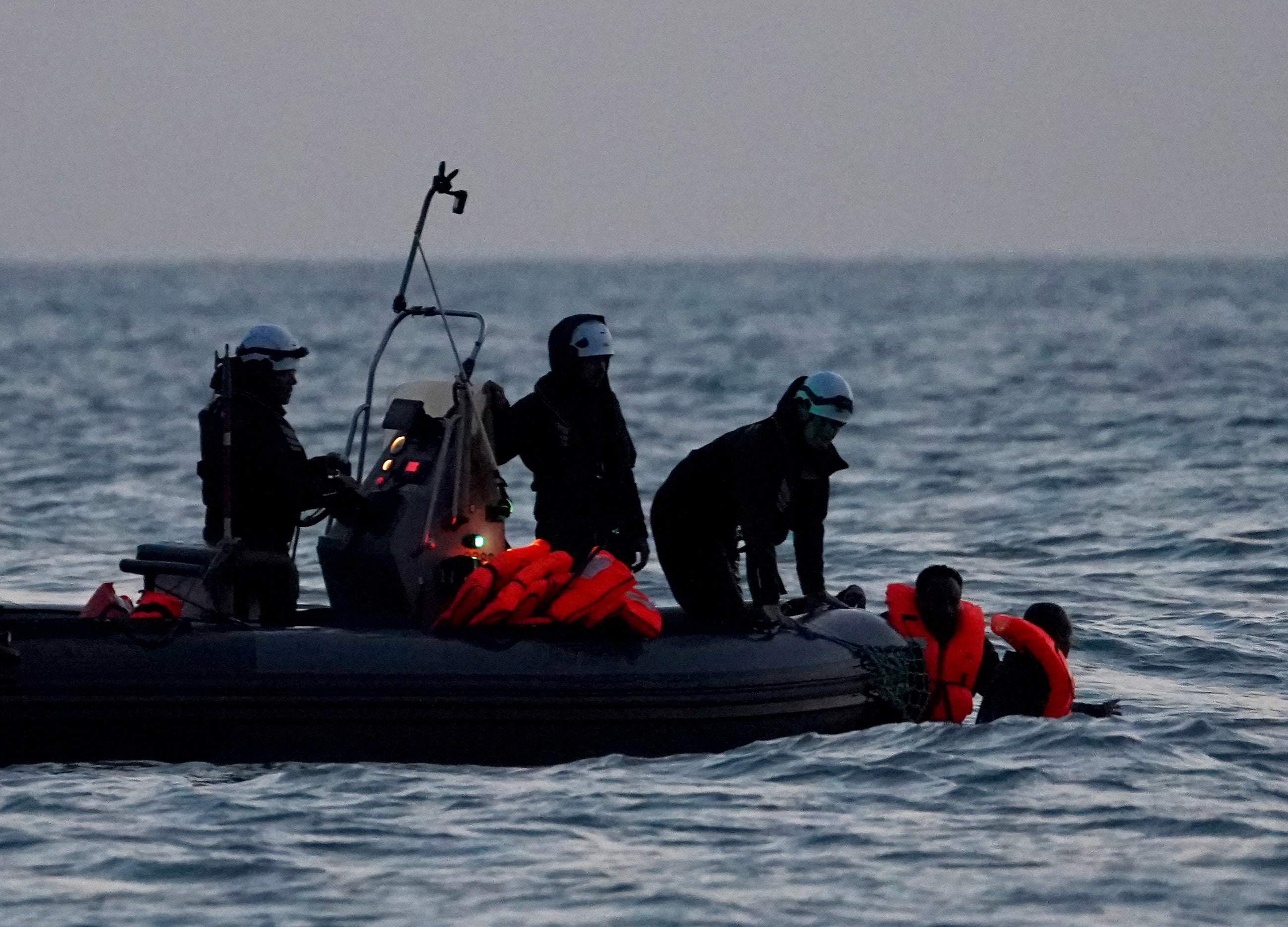 People are rescued from the sea after their attempt to board a small boat from the beach failed near Dunkirk on Thursday (Gareth Fuller/PA) (PA Wire)