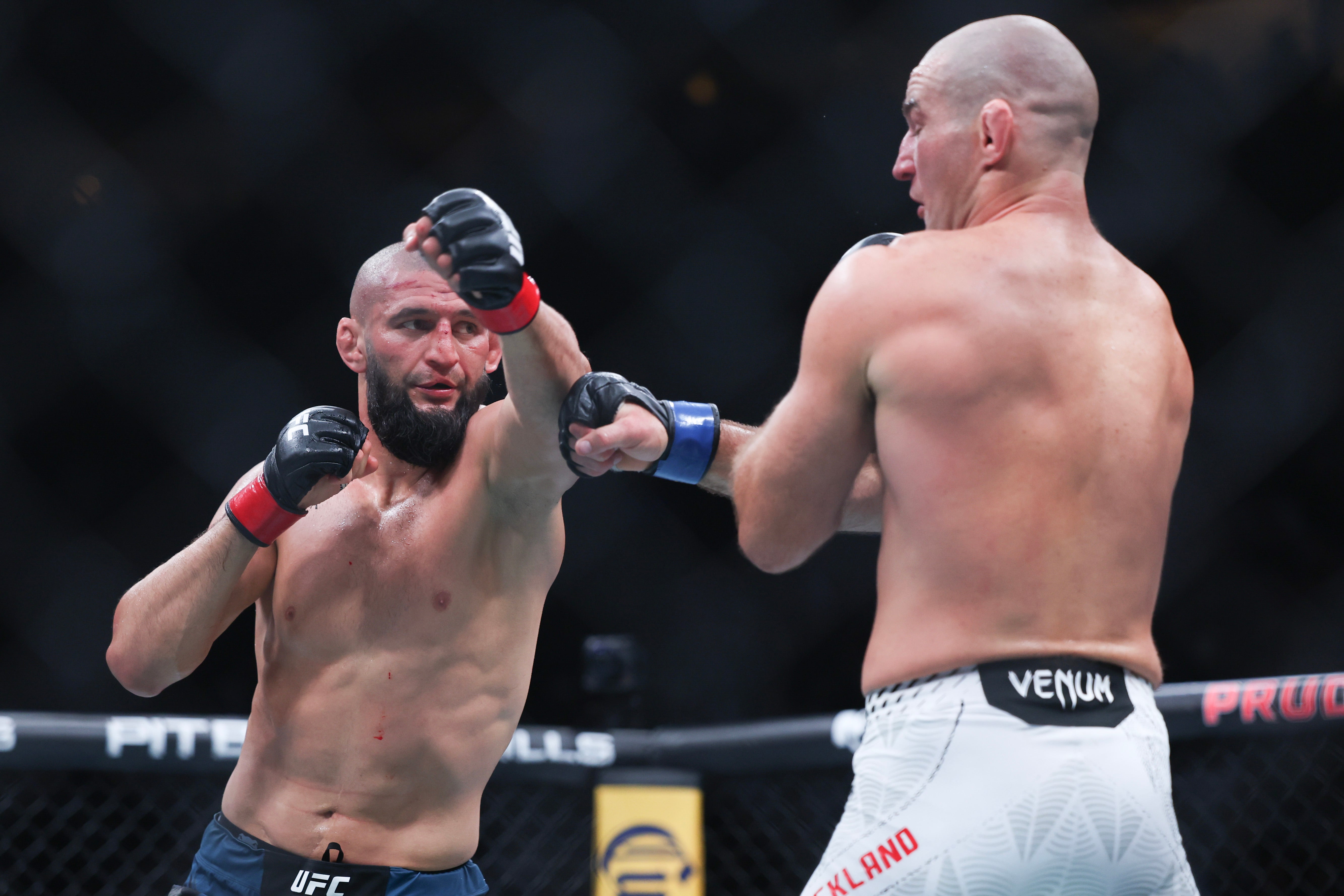 Khamzat Chimaev (left) during his UFC title loss to Sean Strickland in May